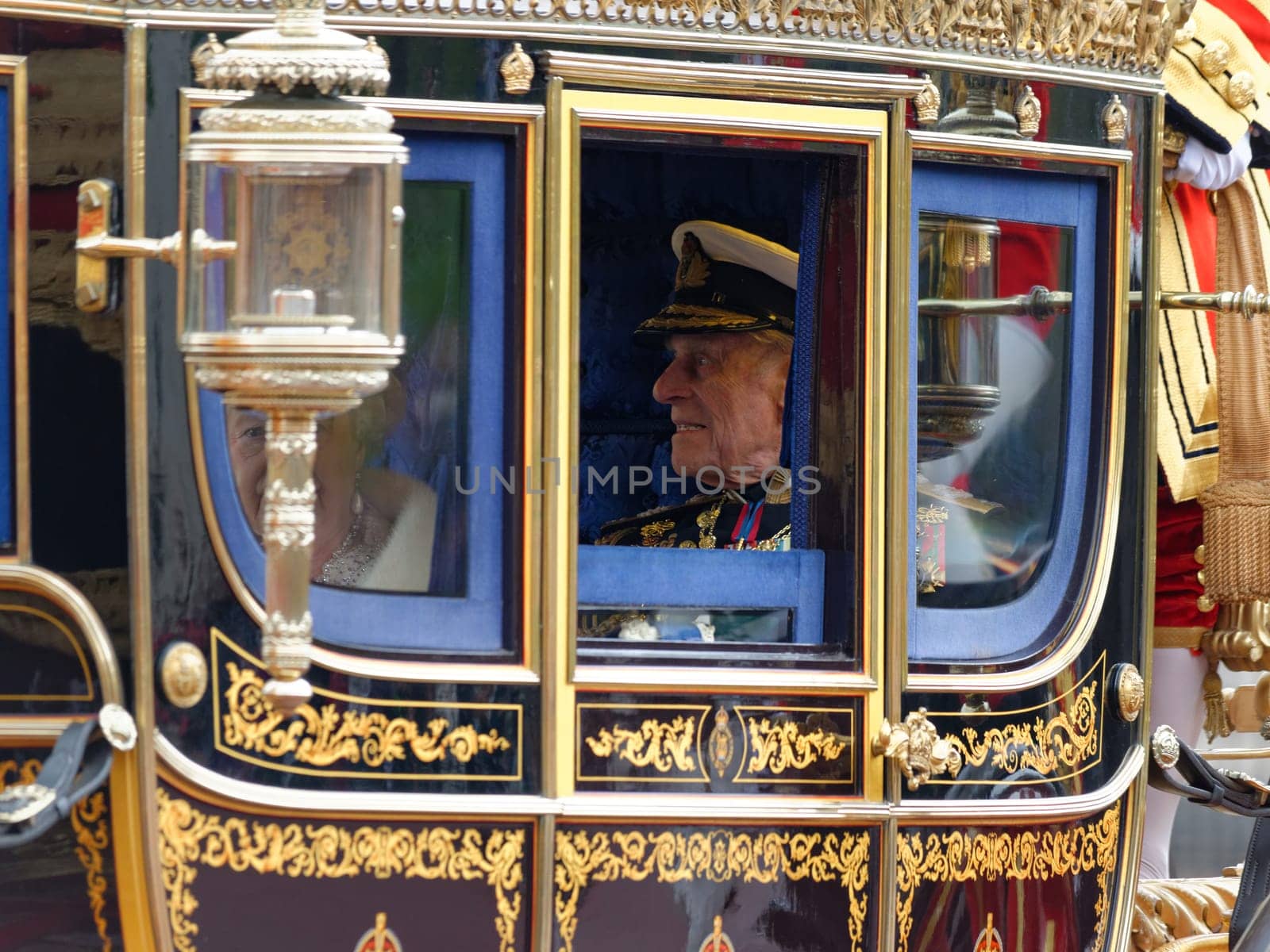 London, UK. May 8th, 2013. Queen Elizabeth II and Prince Philip leaving Buckingham Palace and going to the State Opening of Parliament.