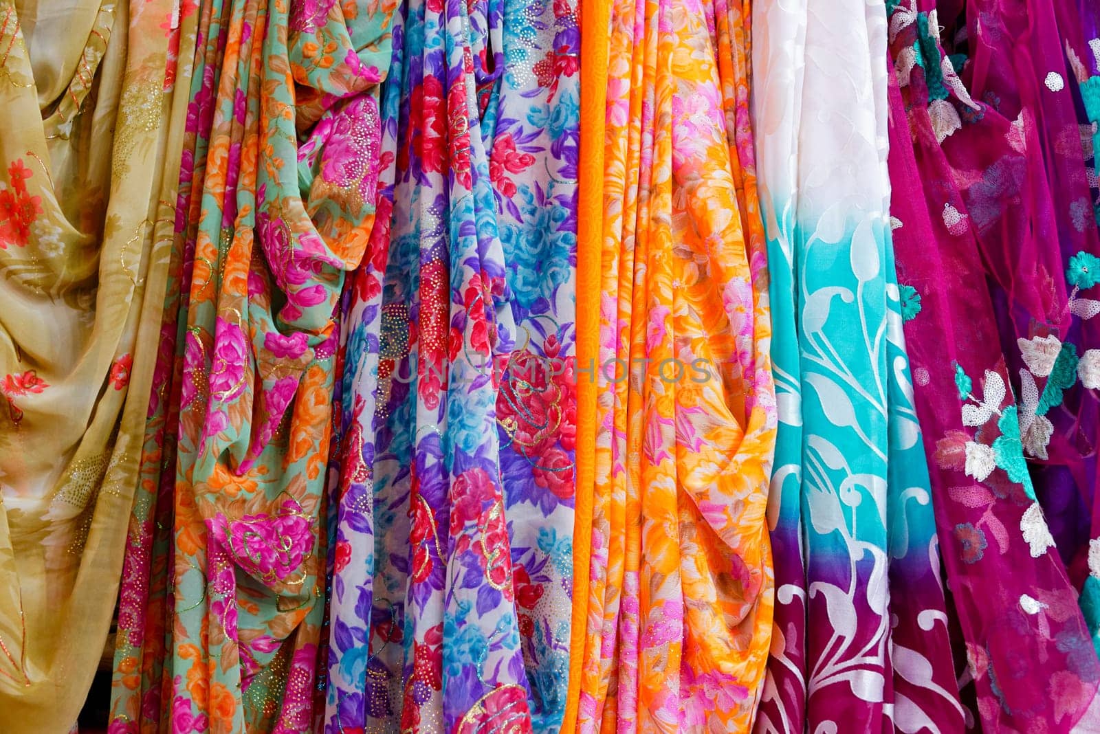 Colorful clothes and saris on display