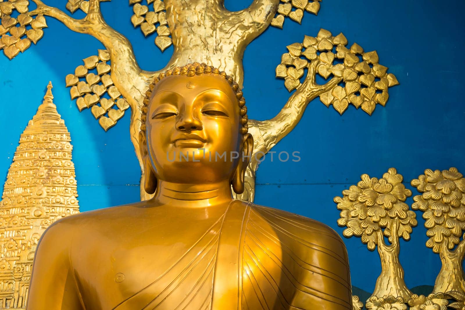 Golden Buddha statue at the World Peace Pagoda in Pokhara, Nepal
