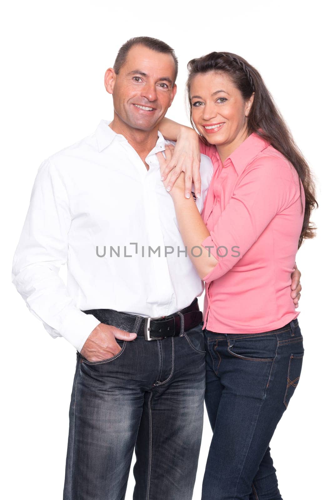 Happy middle-aged couple against a white background
