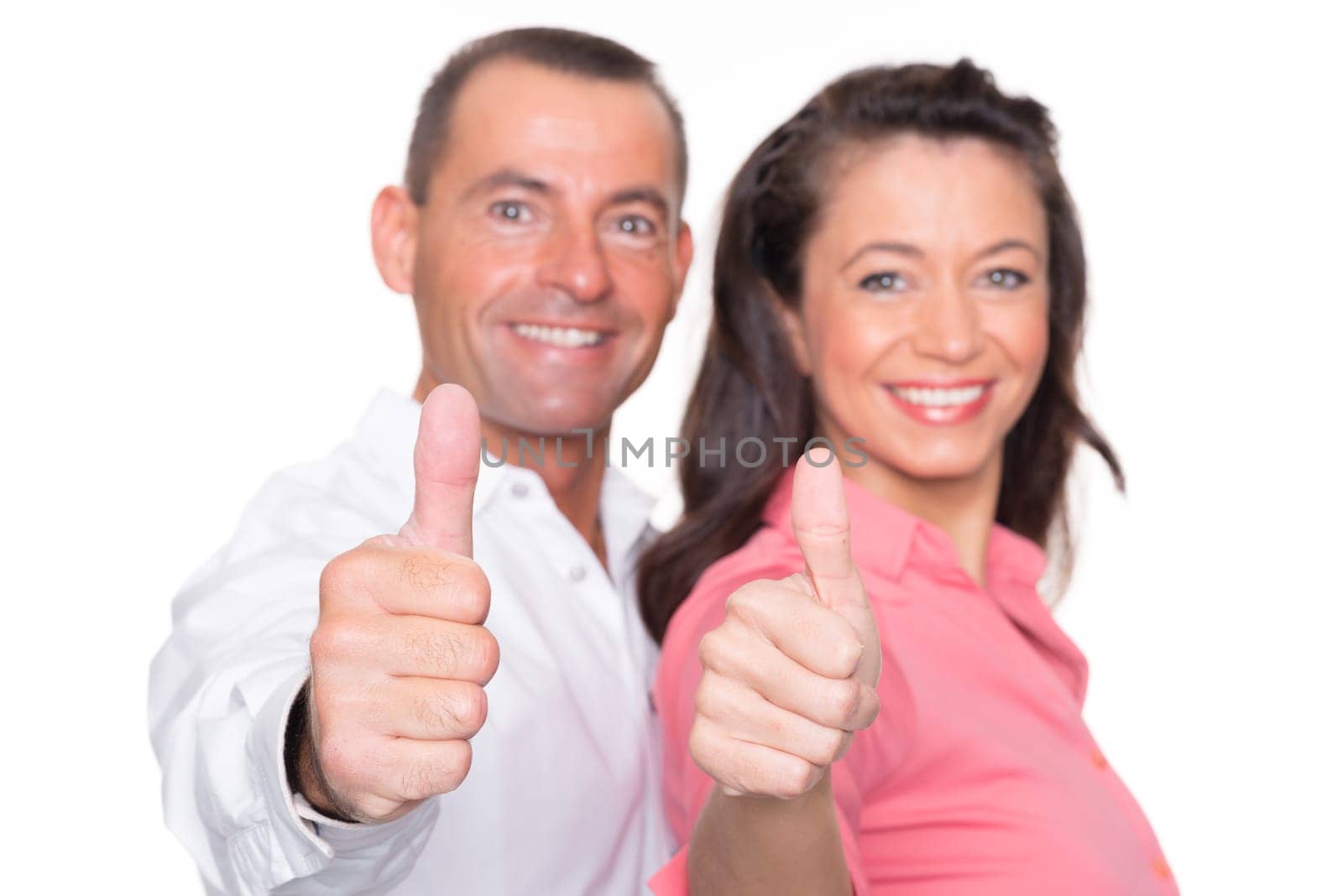Happy middle-aged couple against a white background