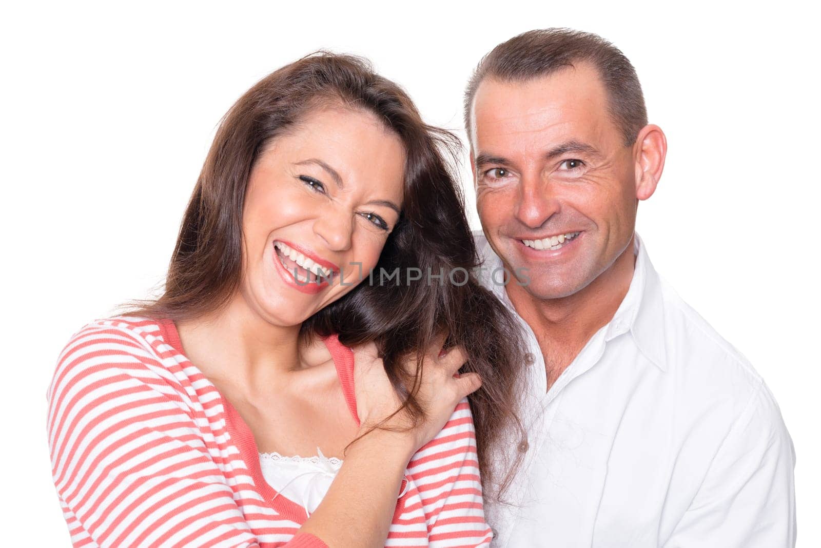 Happy middle-aged couple against a white background