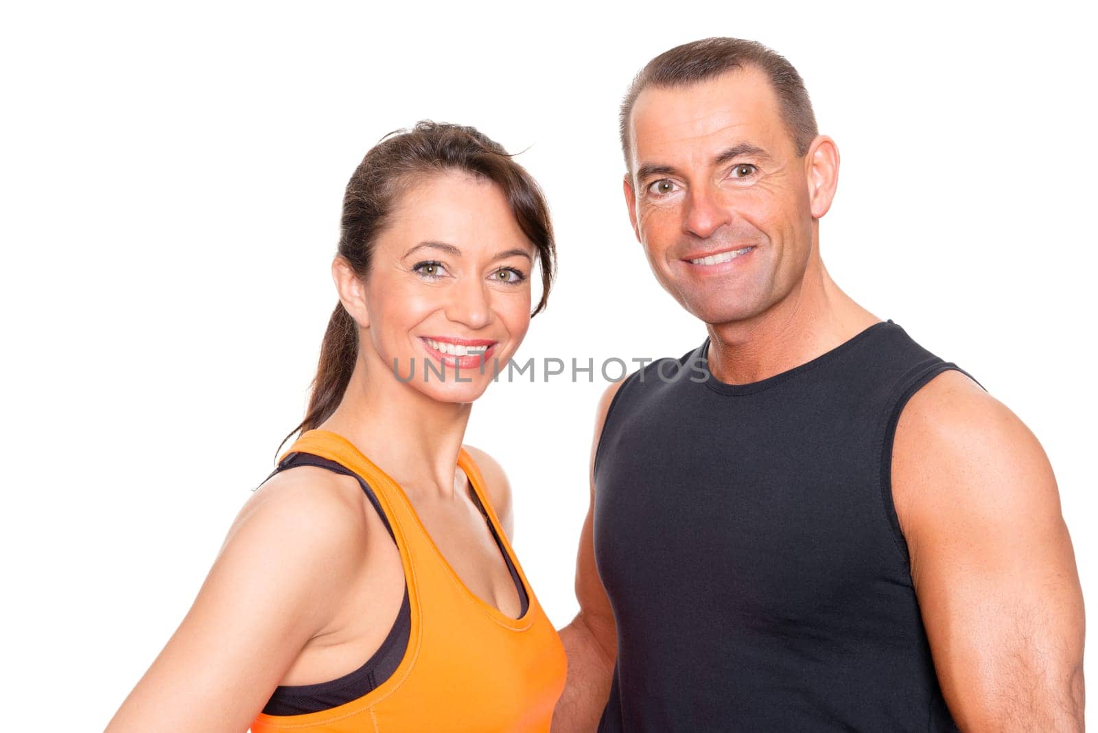 Sporty couple against a white background