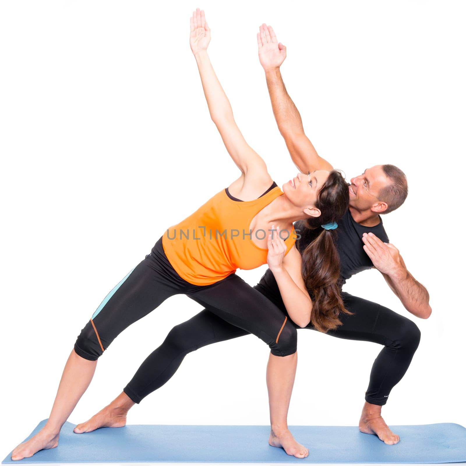 Sporty couple against a white background