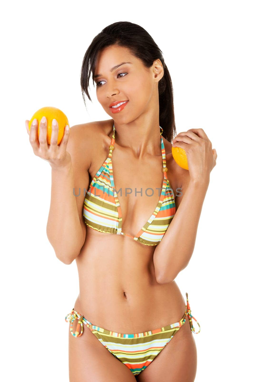 happy summer woman in a bikini with oranges. isolated on white