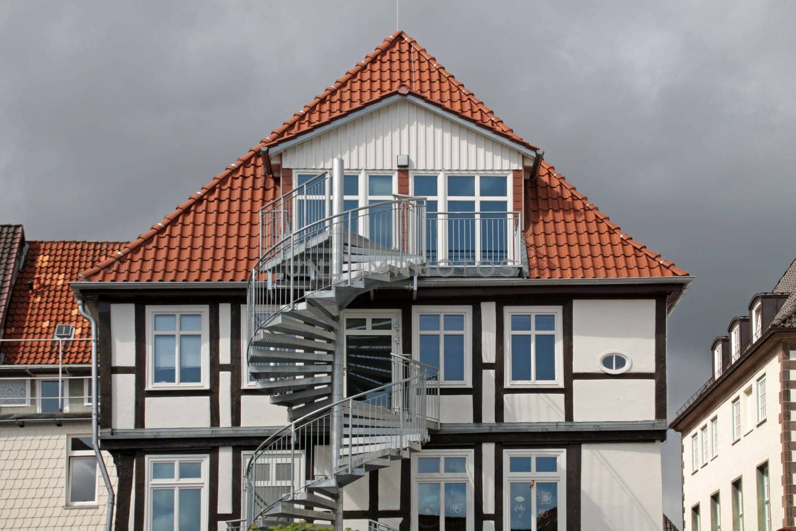 Half-timbered house with external staircase