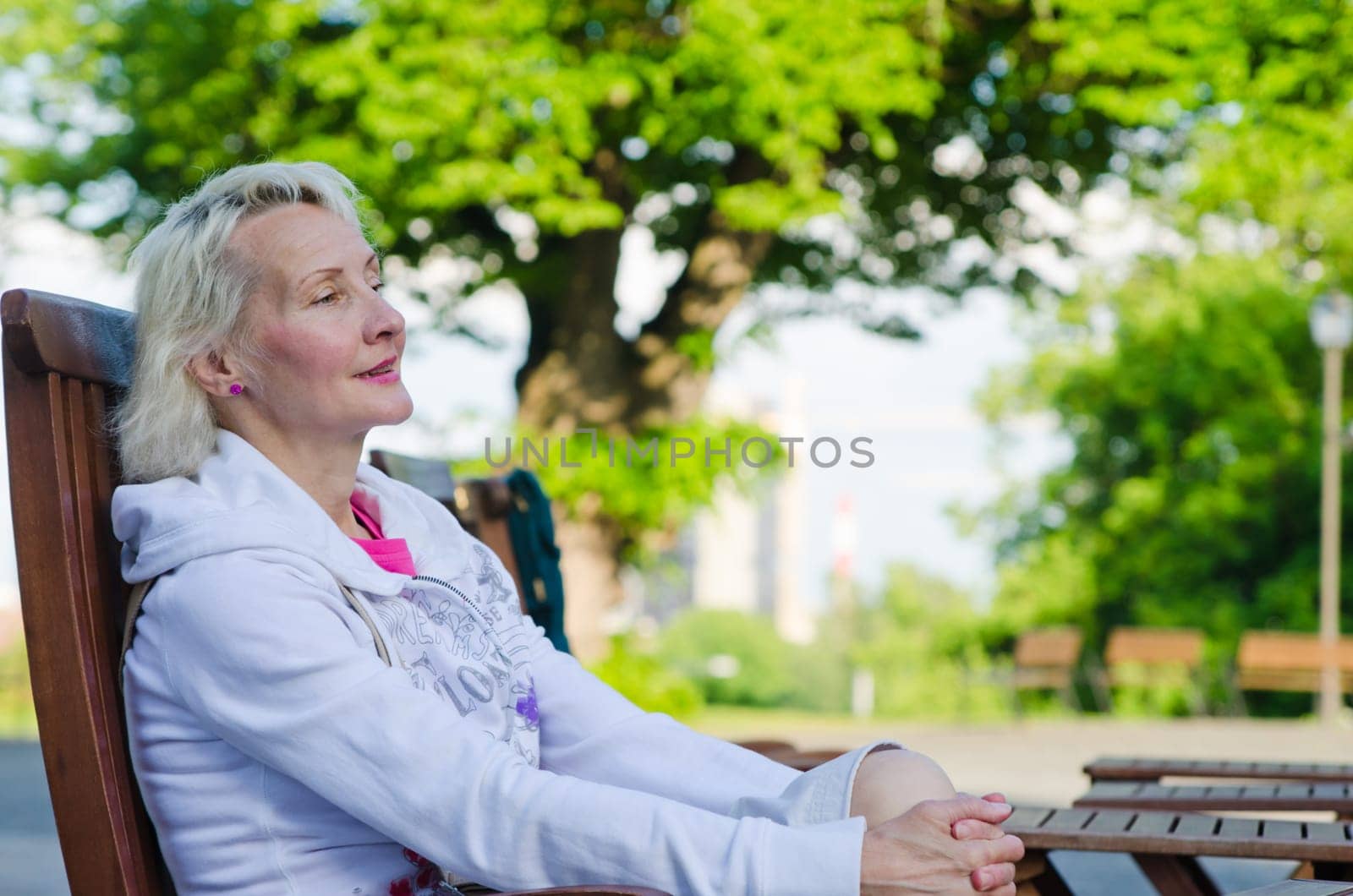 Portrait of a woman relaxing at a table summer Cafe
