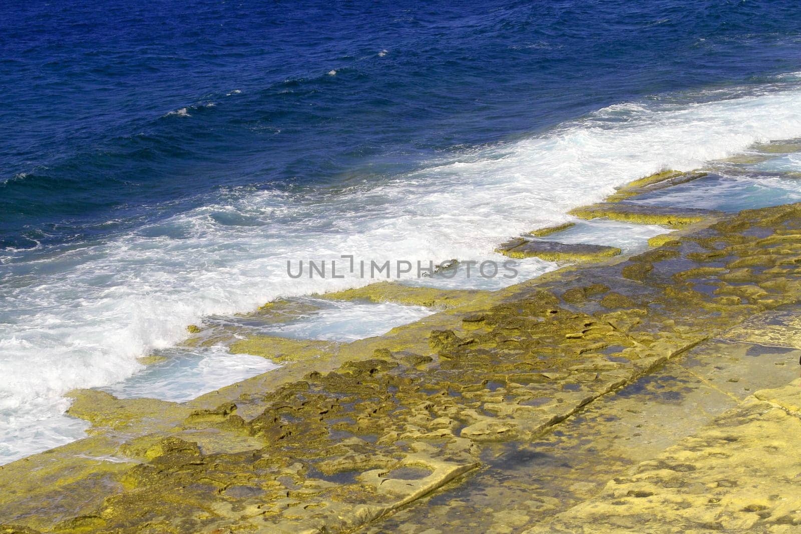 Rocky natural pools in the beach