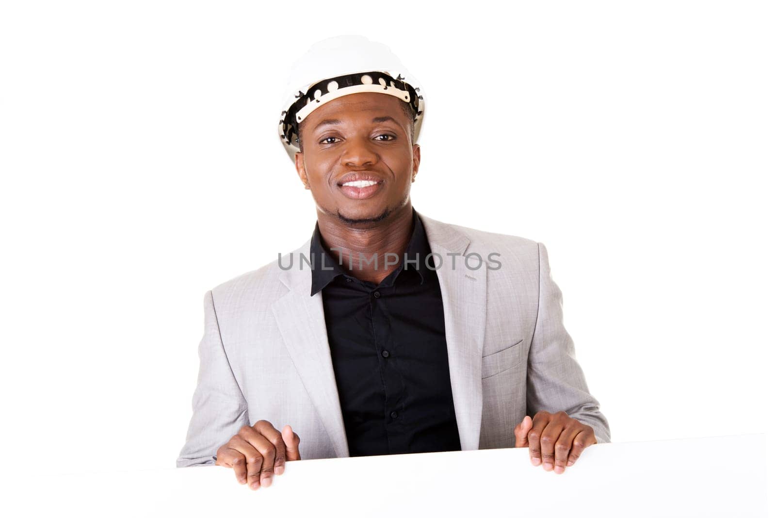 Businessman presenting empty banner. Isolated on white background