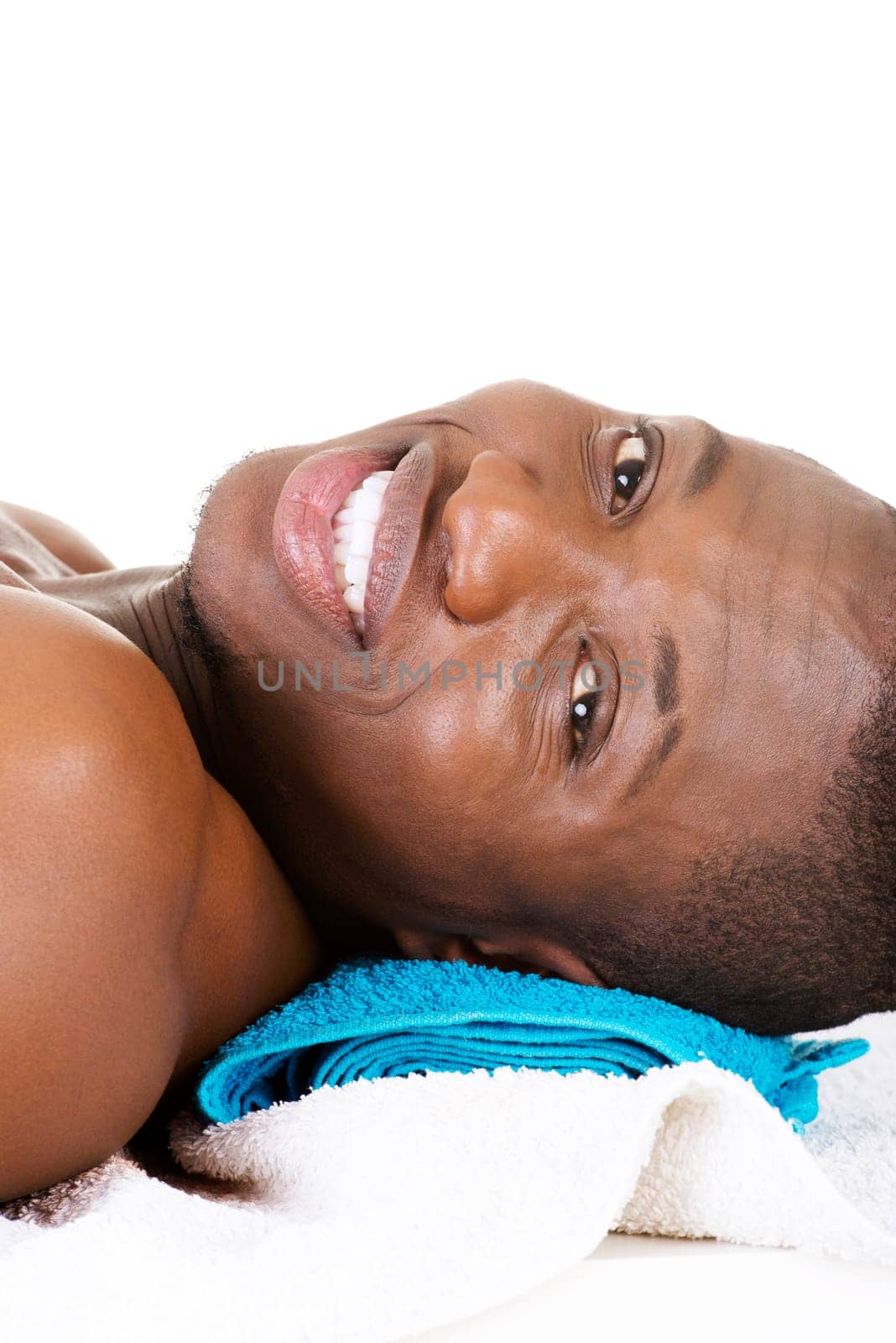 Man receiving massage at spa saloon