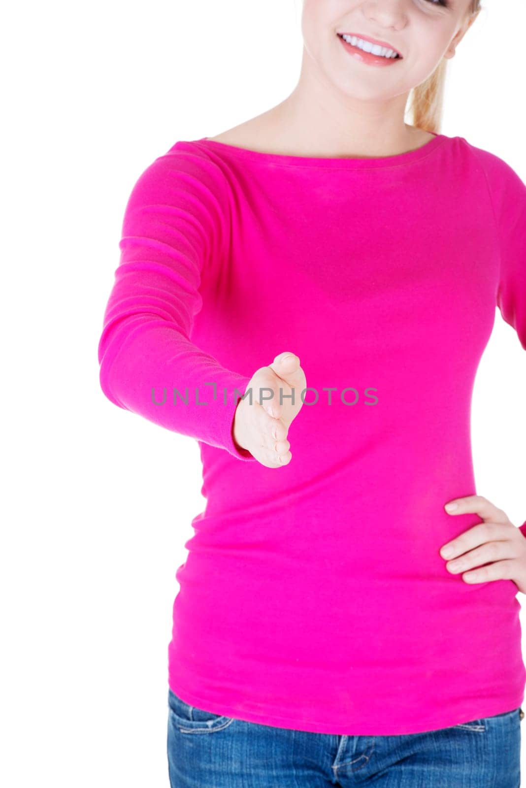 A beautiful young adult woman about to shake hands.