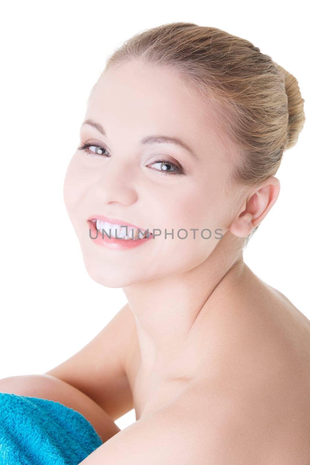 Young beautiful nude woman with towel , isolated on white