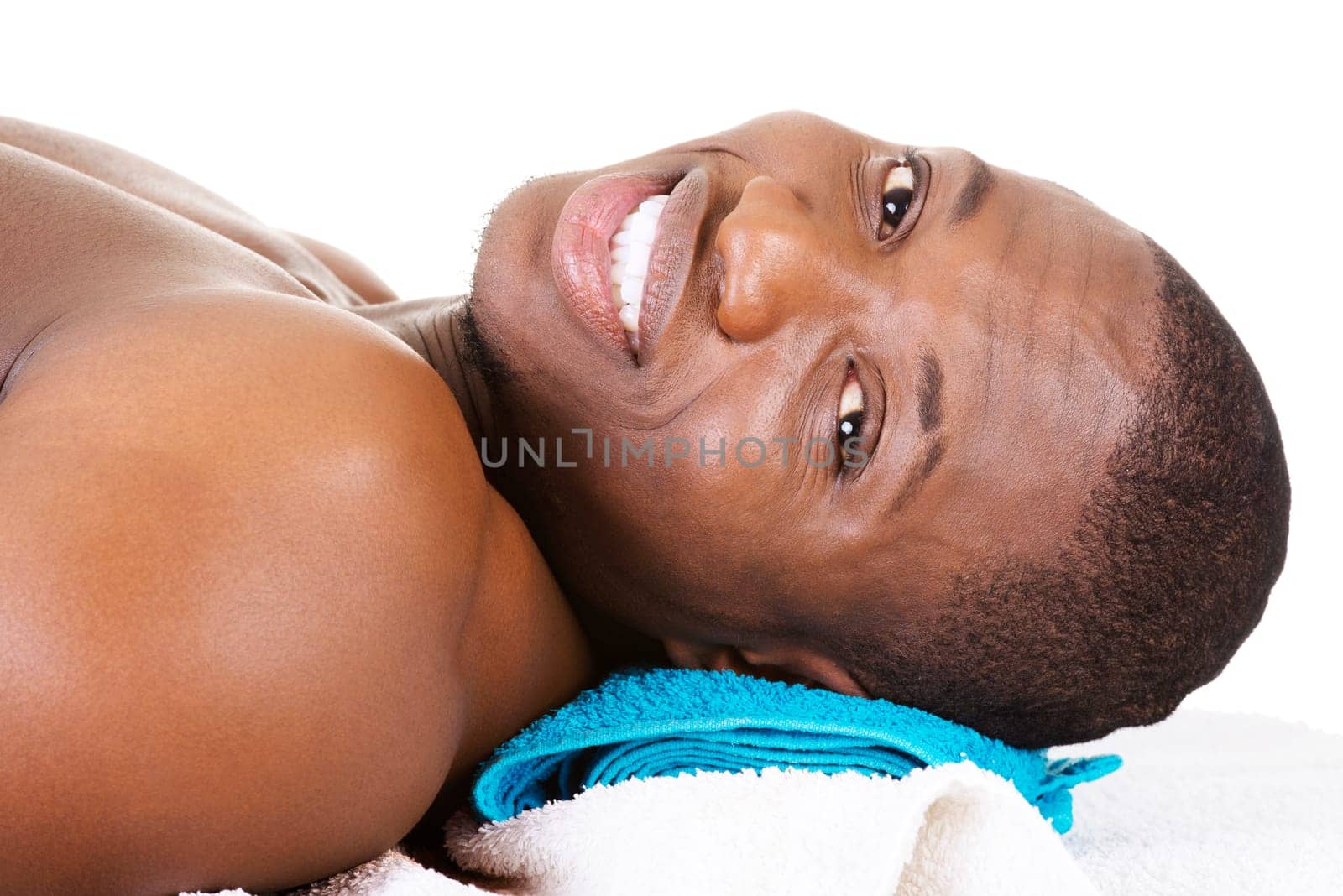 Man receiving massage at spa saloon