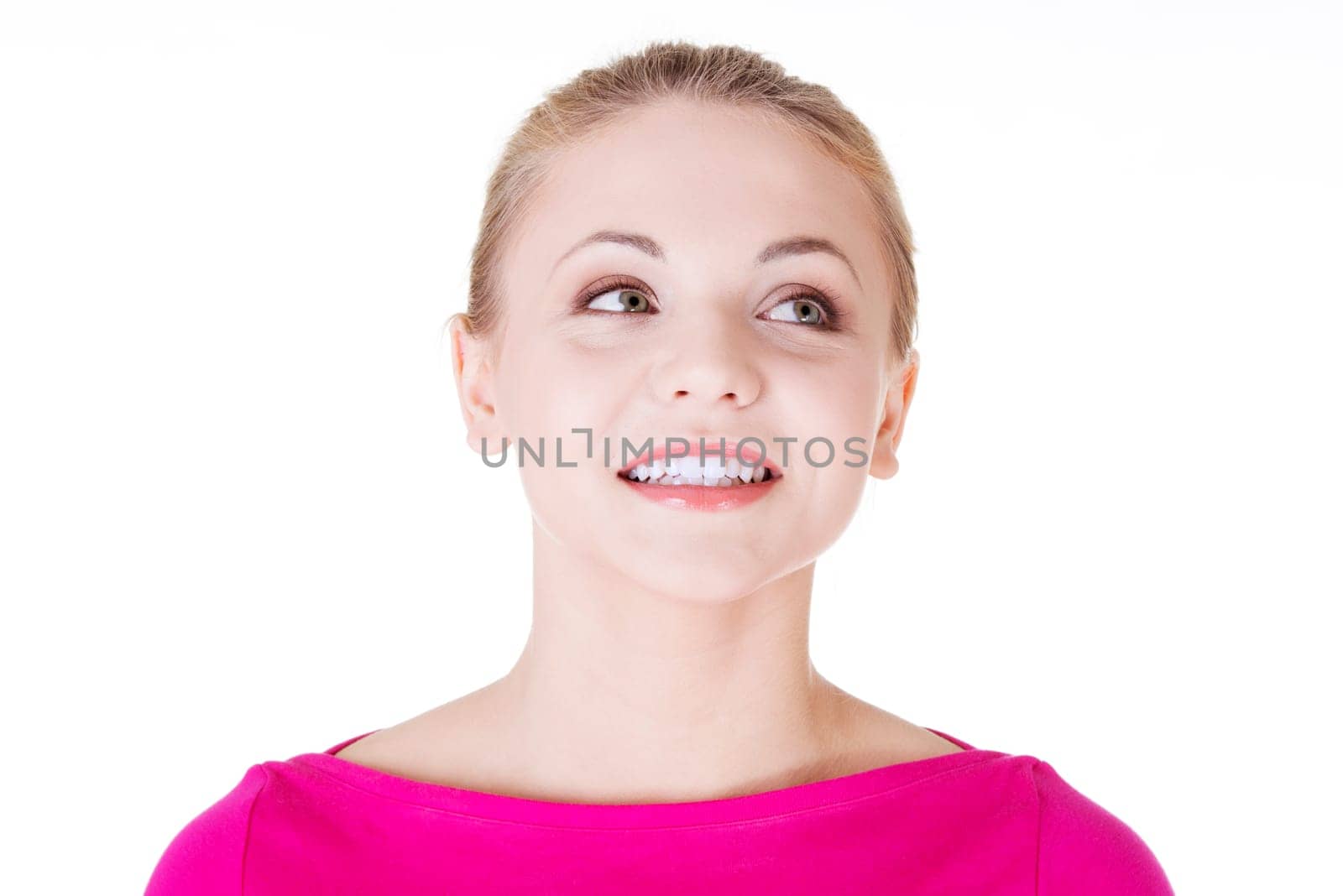 Surprised and excited woman looking up, isolated on white