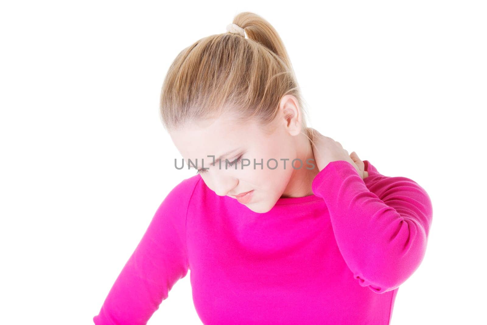 oung woman holding hand on her neck. Neck pain concept .
