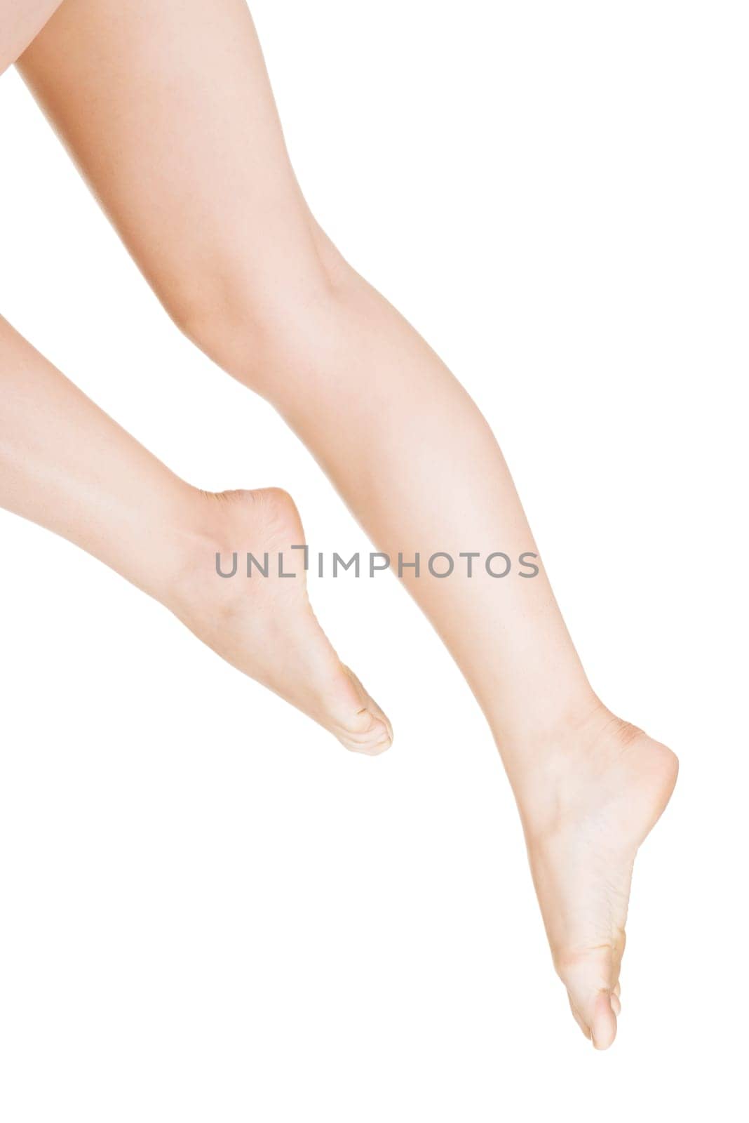 Beautiful fit long female legs, isolated on white