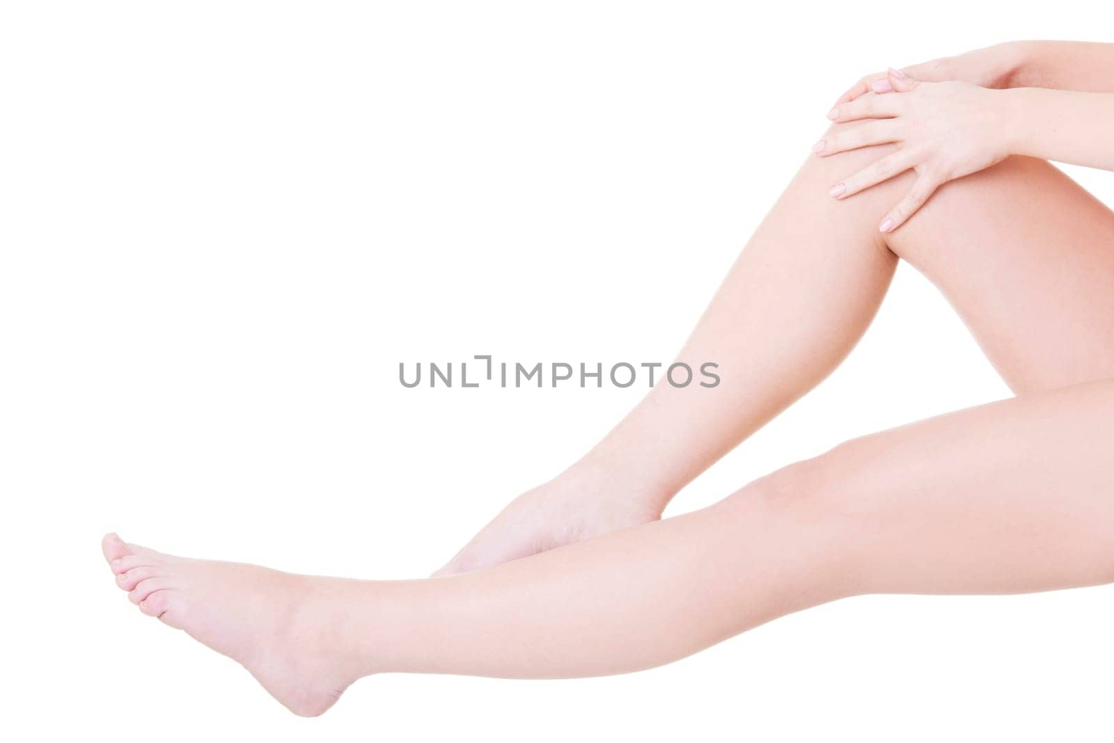 Beautiful fit long female legs, isolated on white