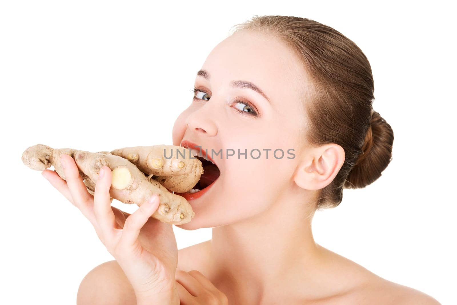 Beautiful woman with fresh ginger, isolated on white