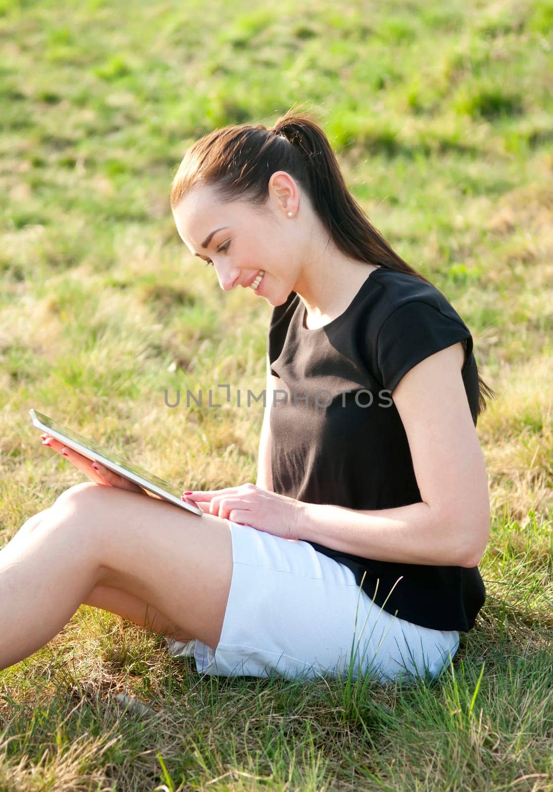Woman with digital tablet