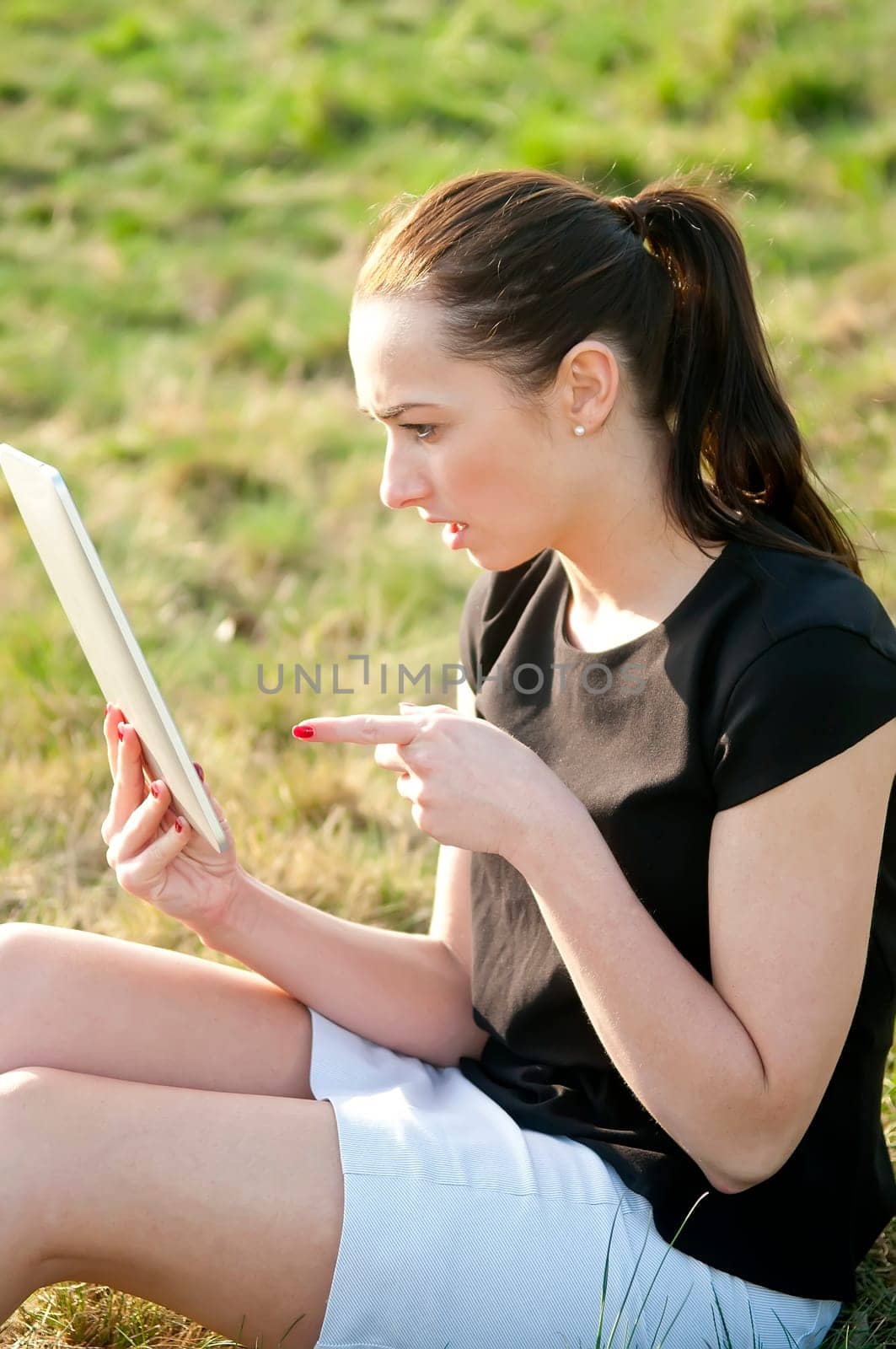 Woman with digital tablet