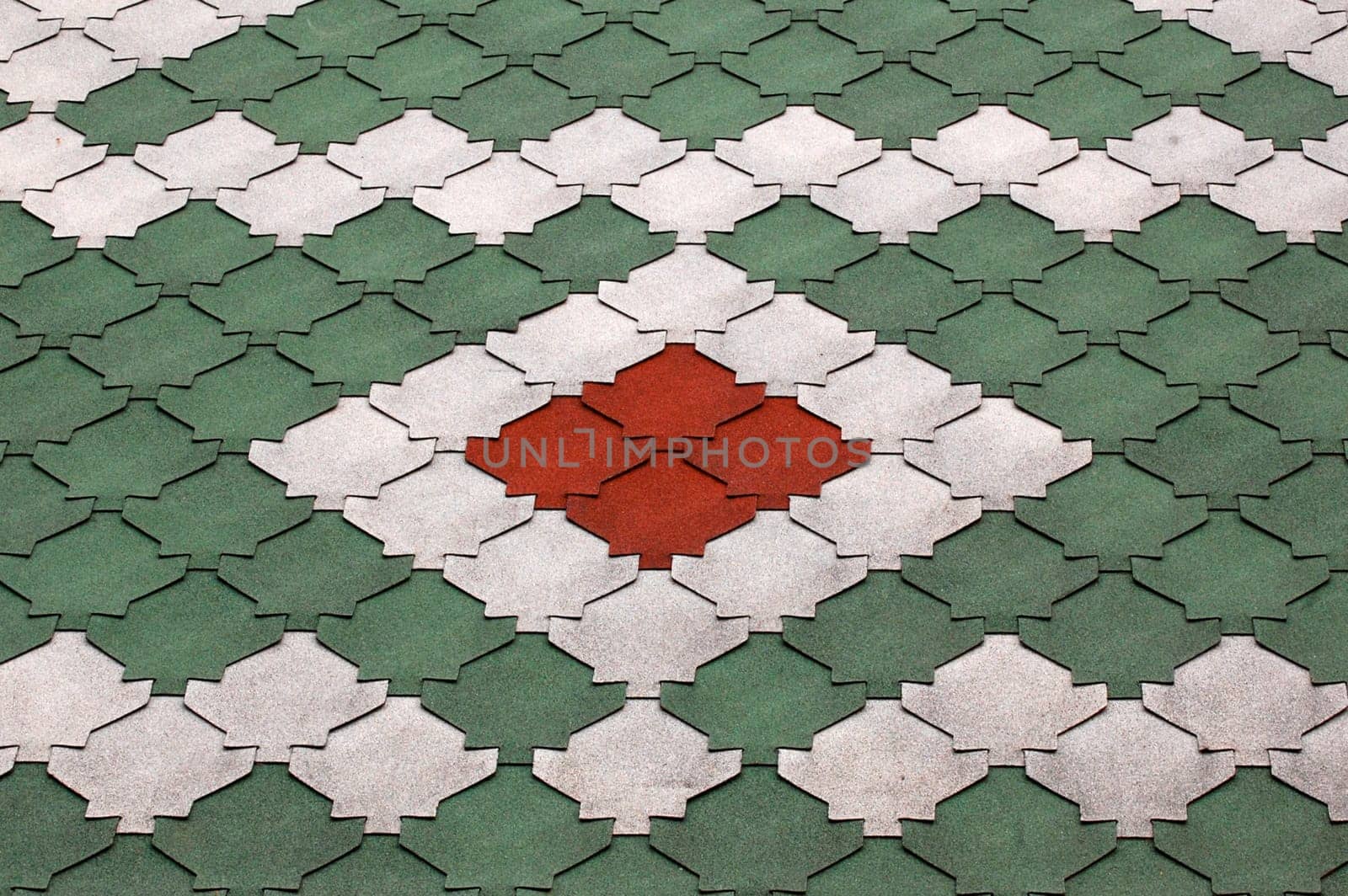 Barn roof multicolored pattern in red, green, and white