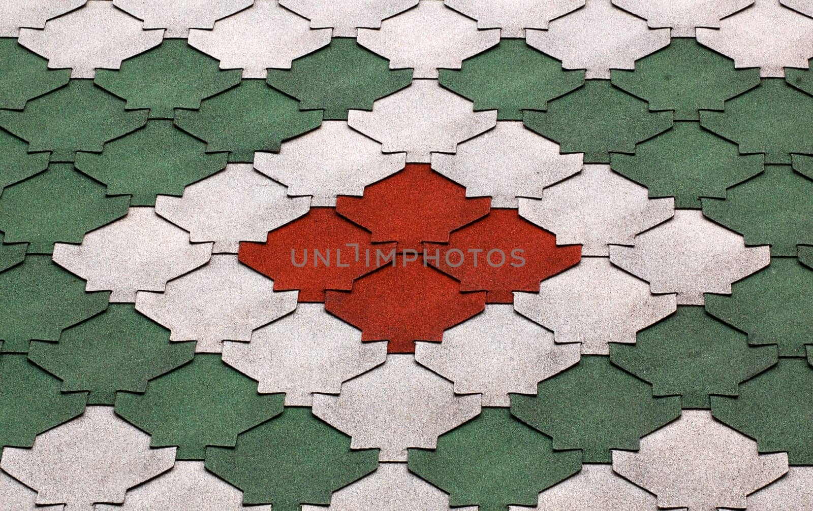 Close up of multicolored pattern on barn roof