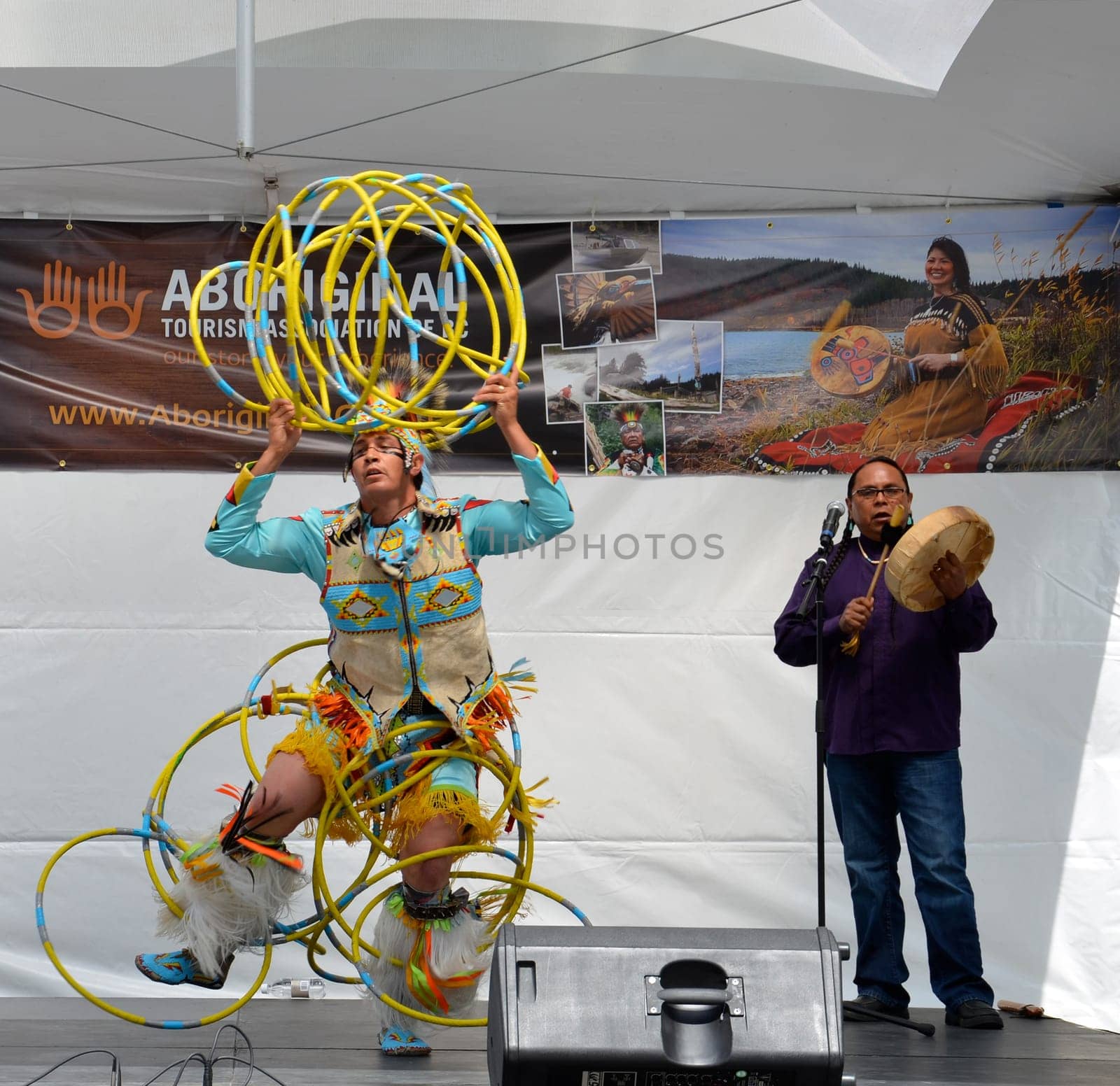 Vancouver, BC - June 26:  World-champion Hoop Dancer Alex Wells concludes his performance at the National Aboriginal Awareness Celebration, June 26, 2011.