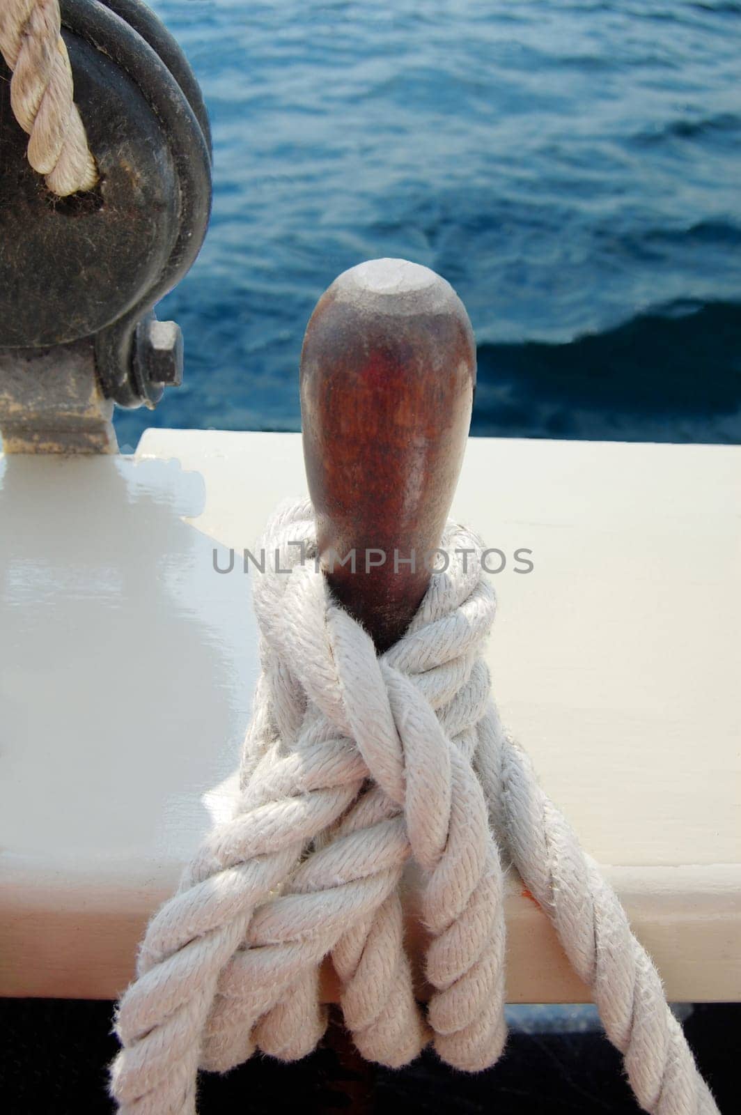 Rope around belaying pin