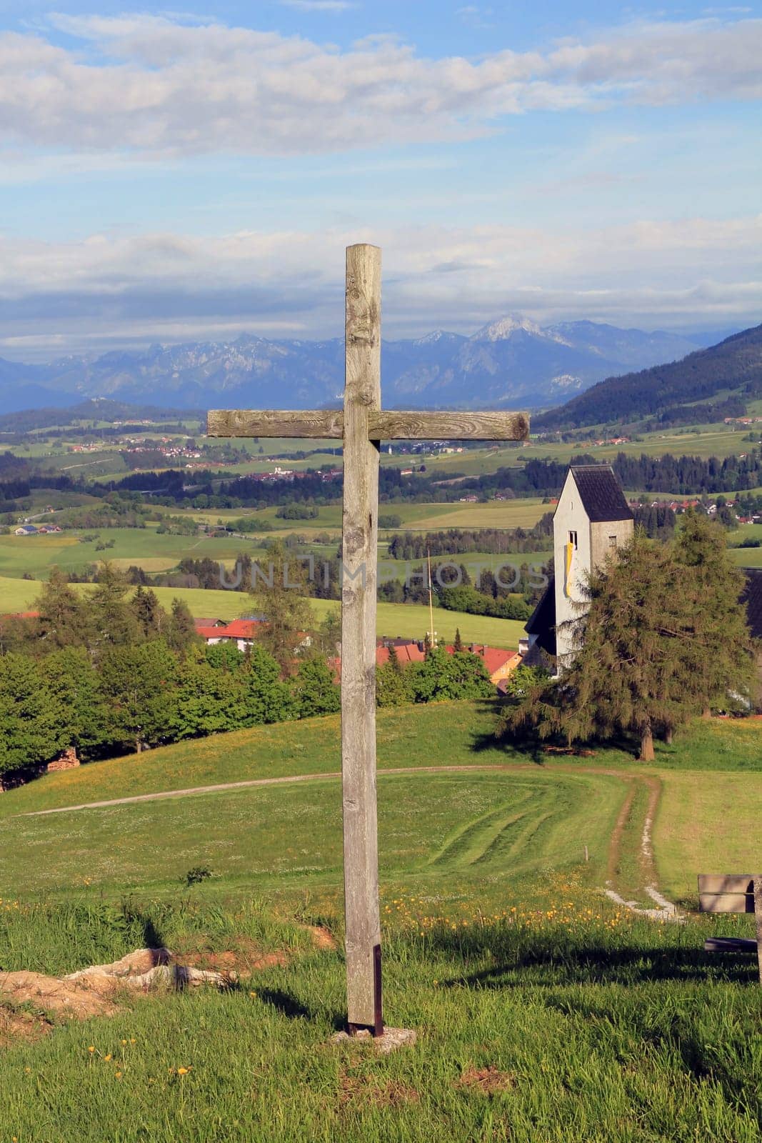 The cross in front of the Mittelberg church in the Allgäu