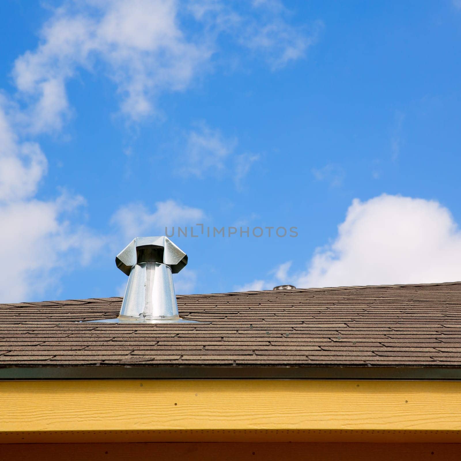 blue  roof skylight window chimney cloud sky