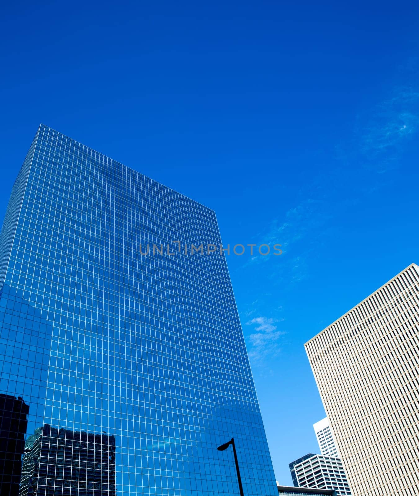 Downtown Houston in Texas cityscape mirror blue skyscrapers details