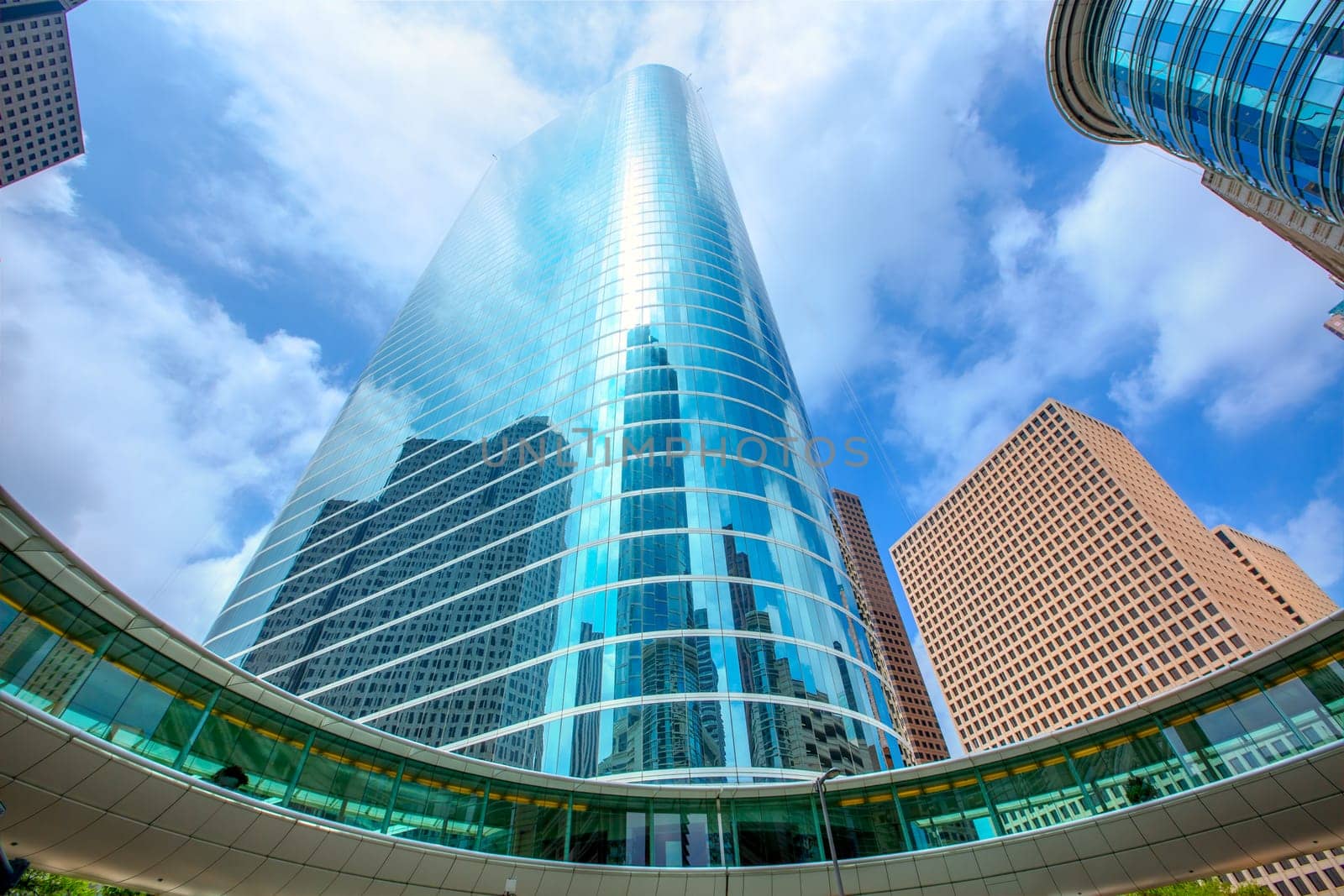 Houston downtown skyscrapers disctict with mirror blue sky reflection