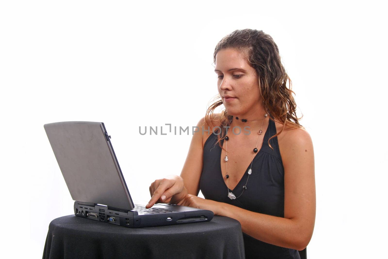 Businesswoman working at desk.