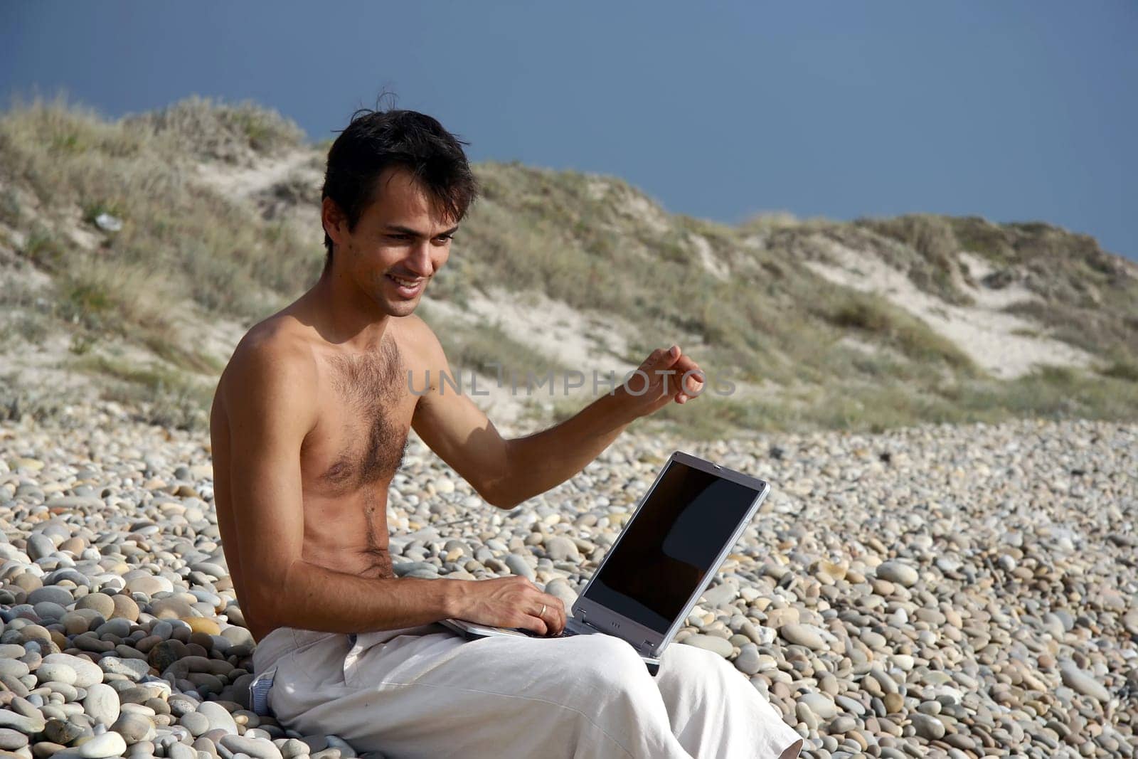 man working on his laptop
