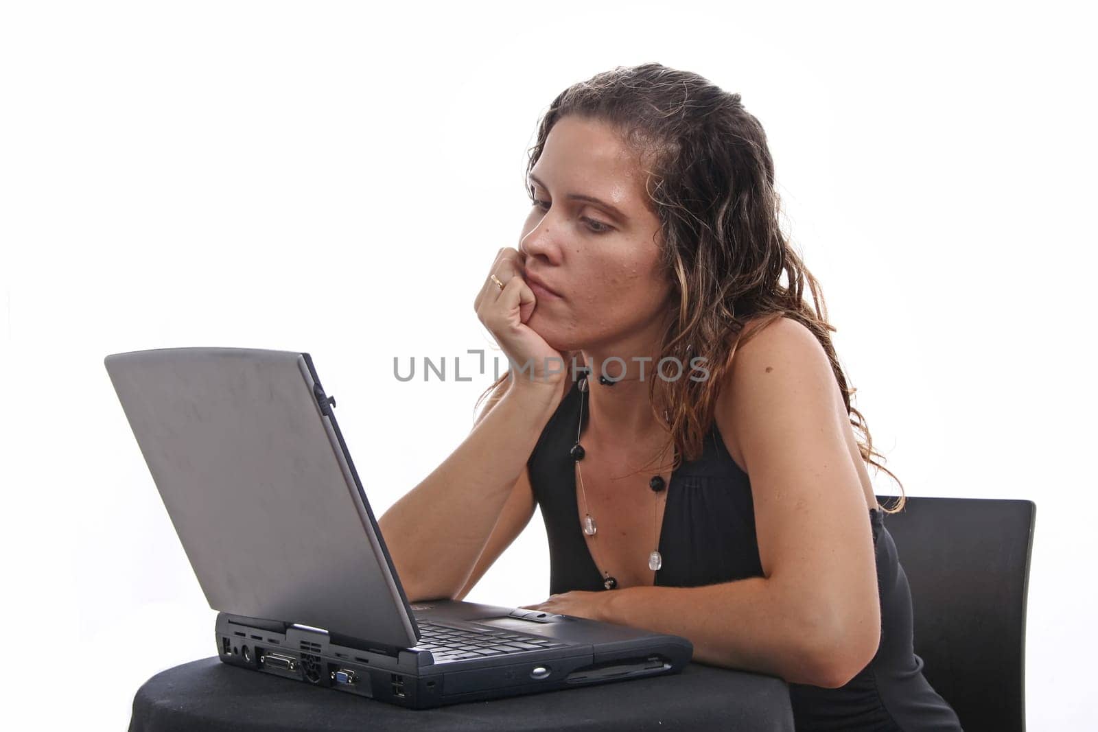 Businesswoman working at desk.