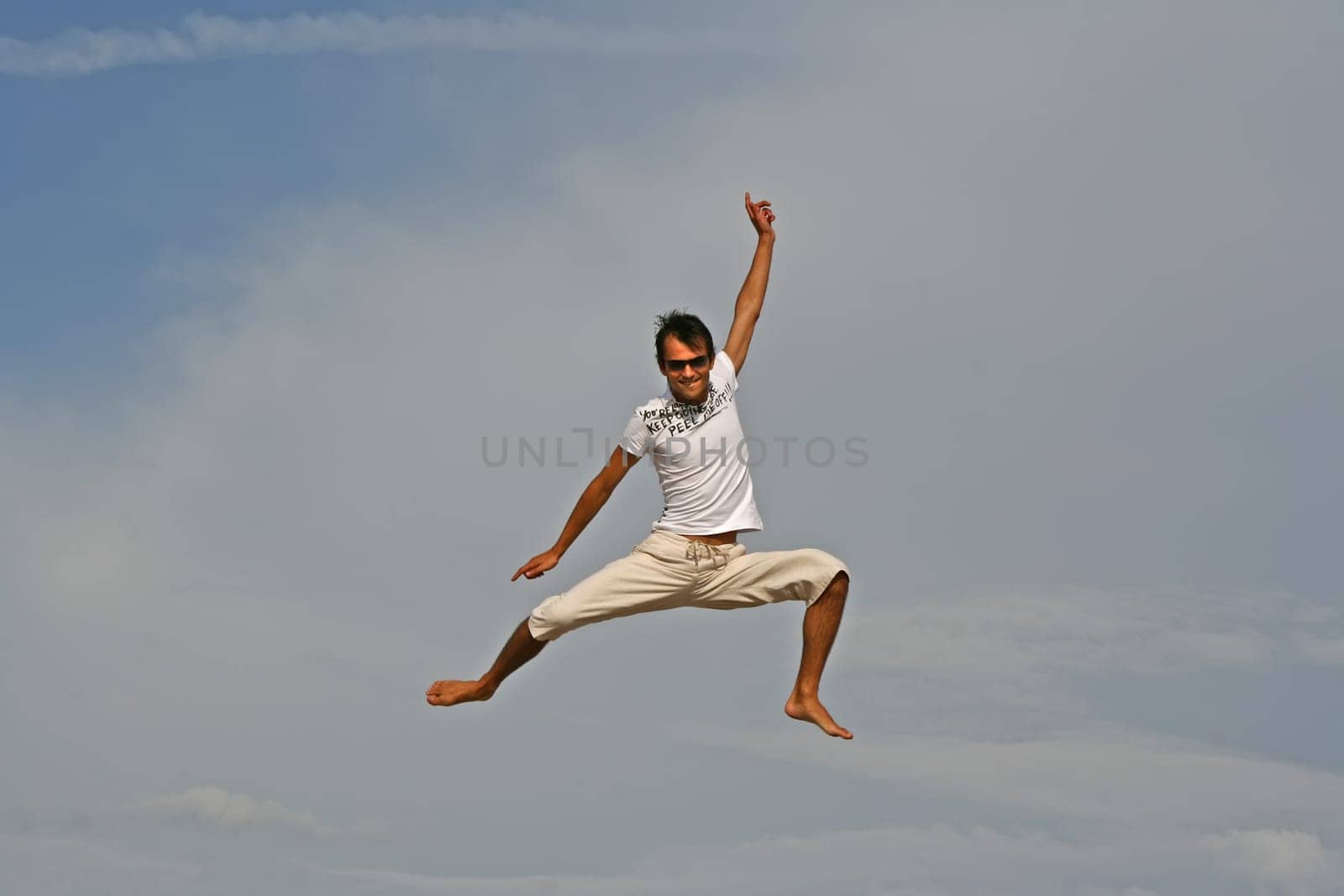 Man jumping on the beach