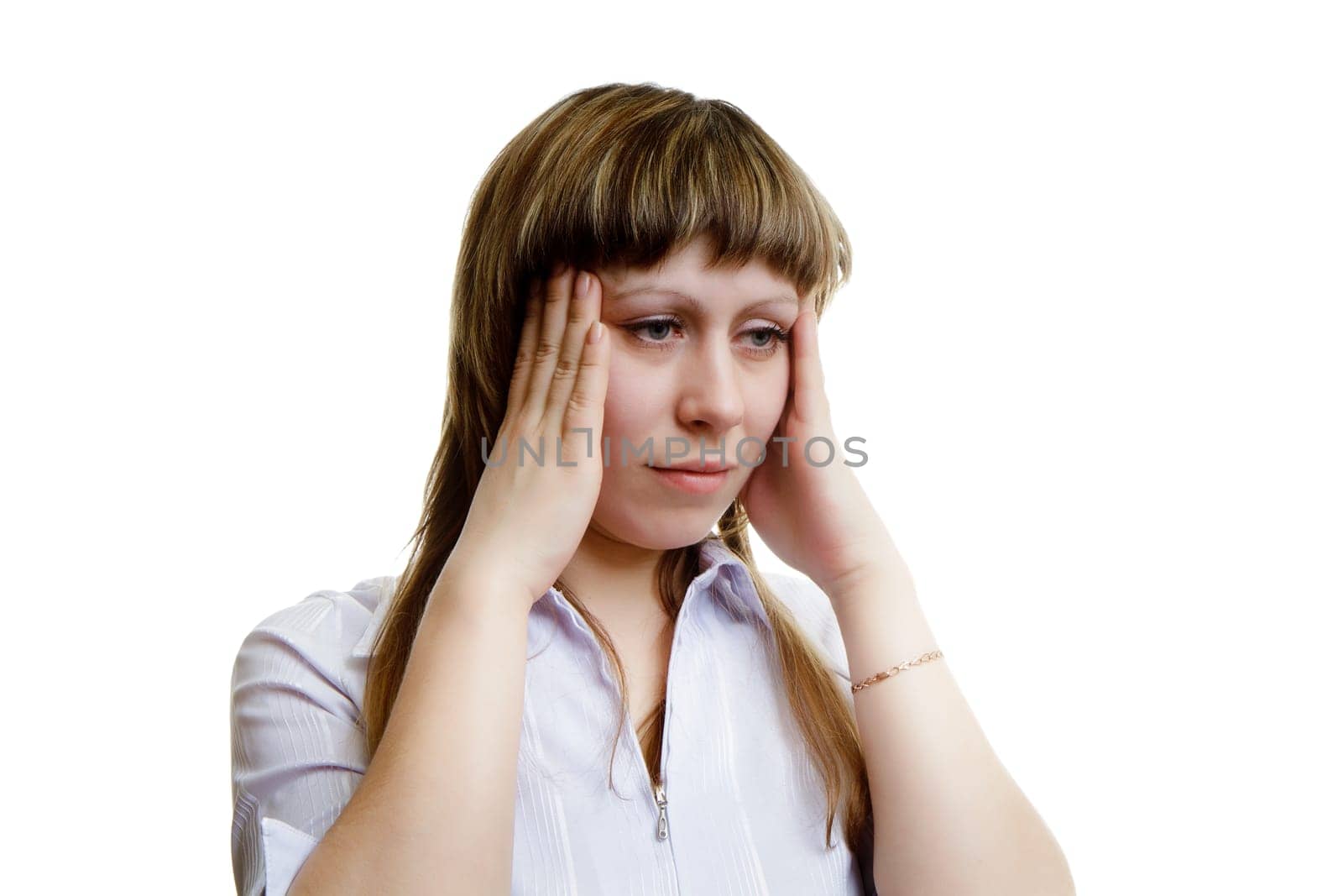 young woman with a headache on a white background
