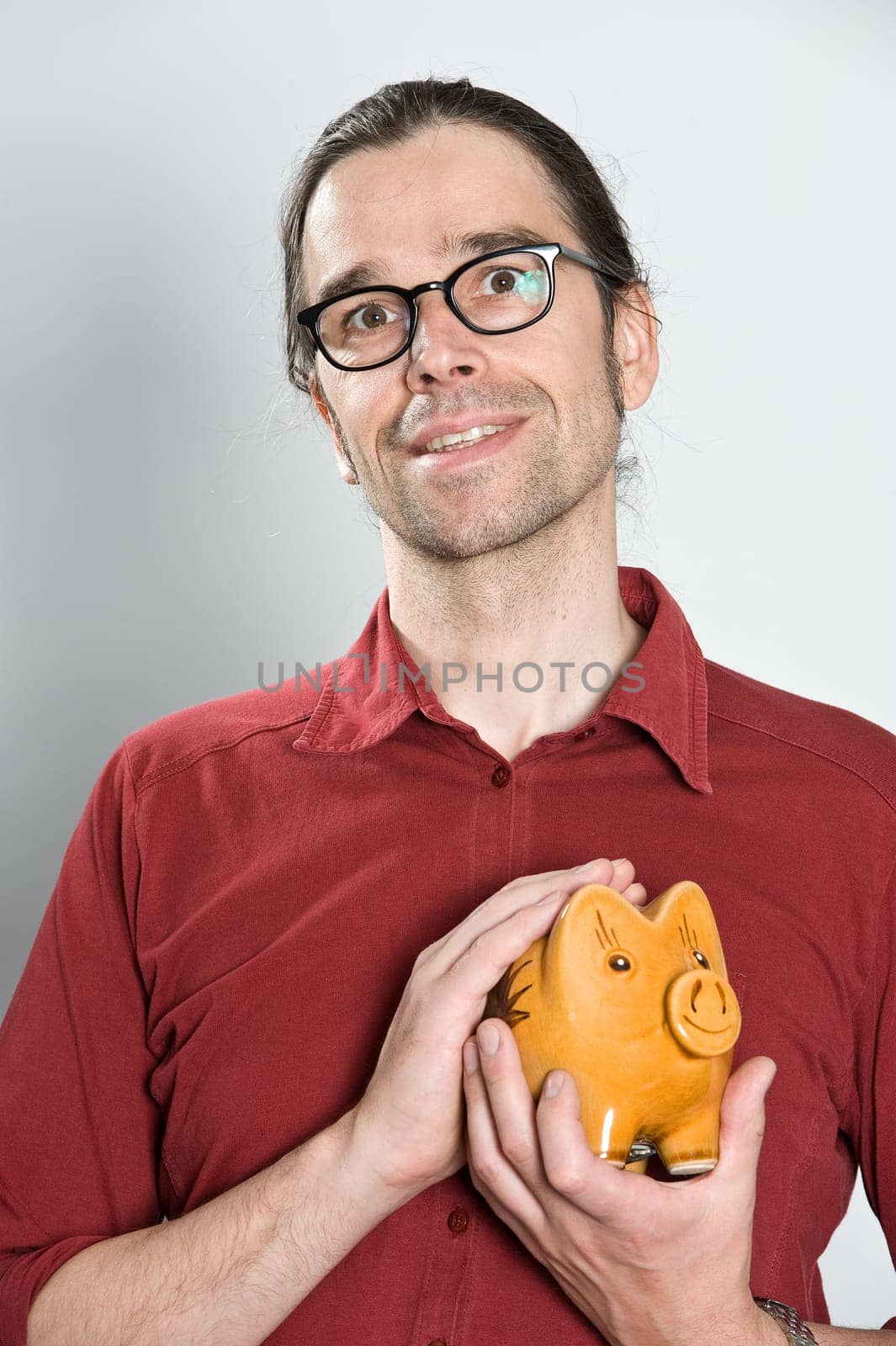 Man with Piggy Bank
