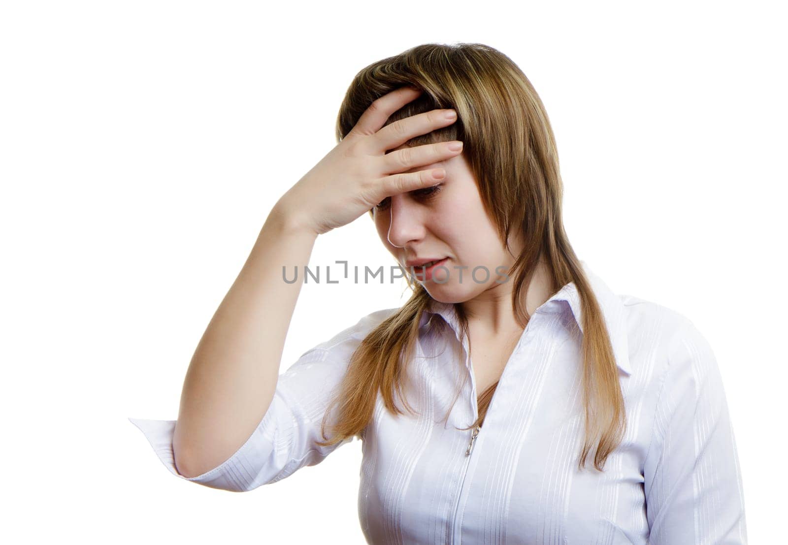 young woman with a headache on a white background