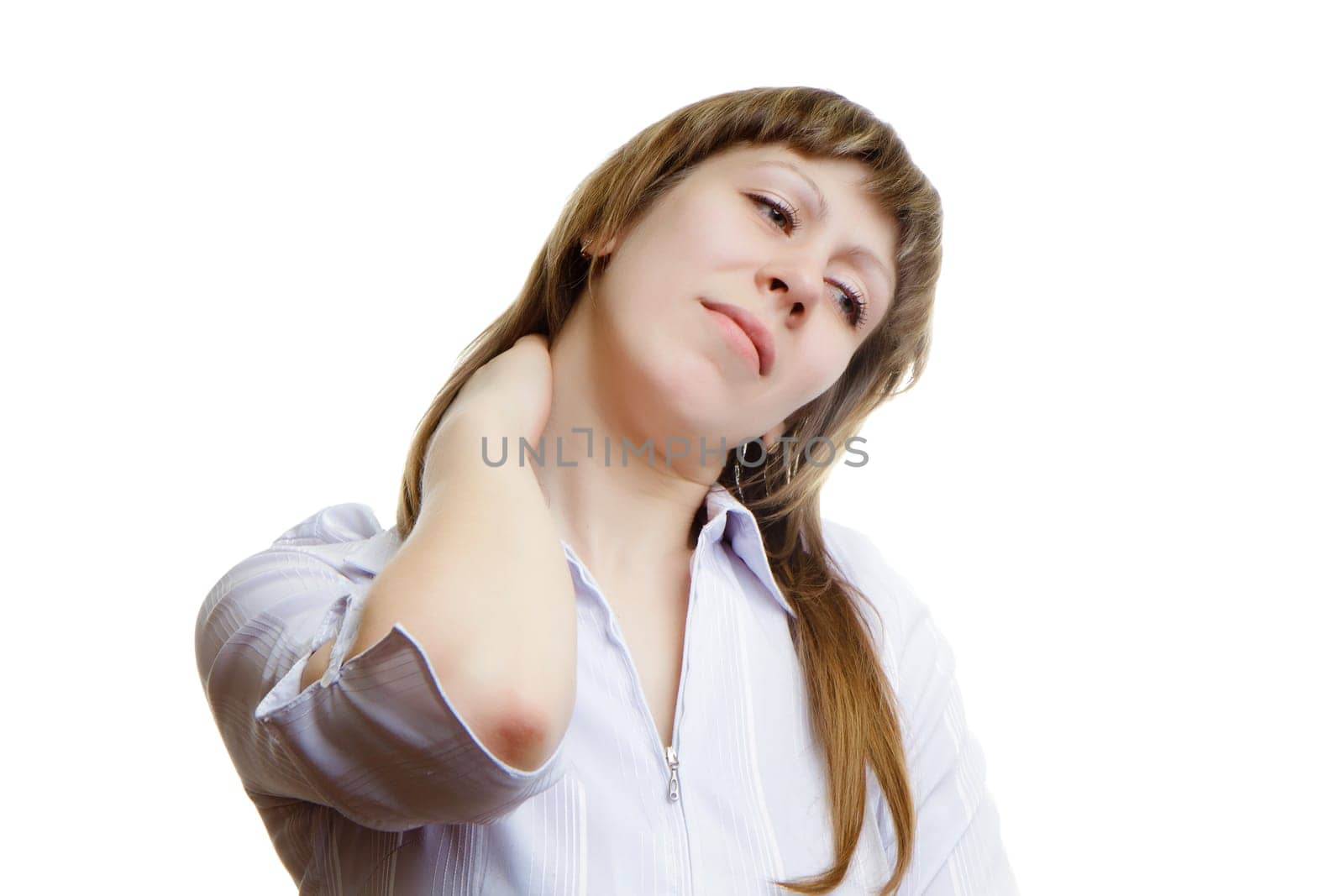 Young girl massaging sore neck on a white background