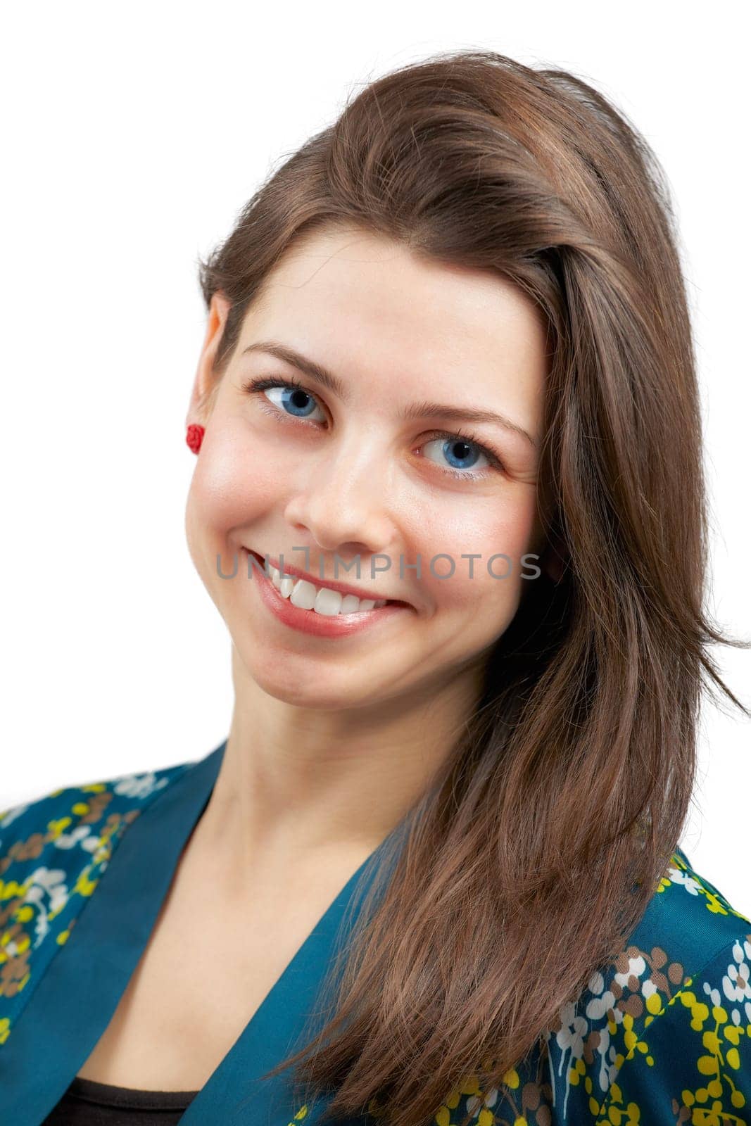 Young woman smiling, looking at camera, dark hair, over white.