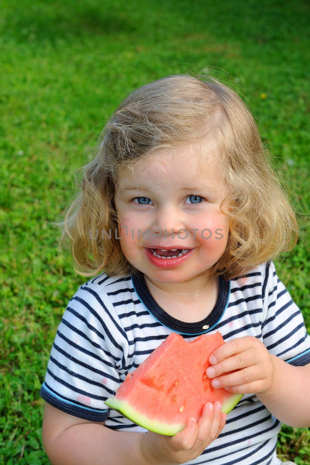 girl is eating water melon