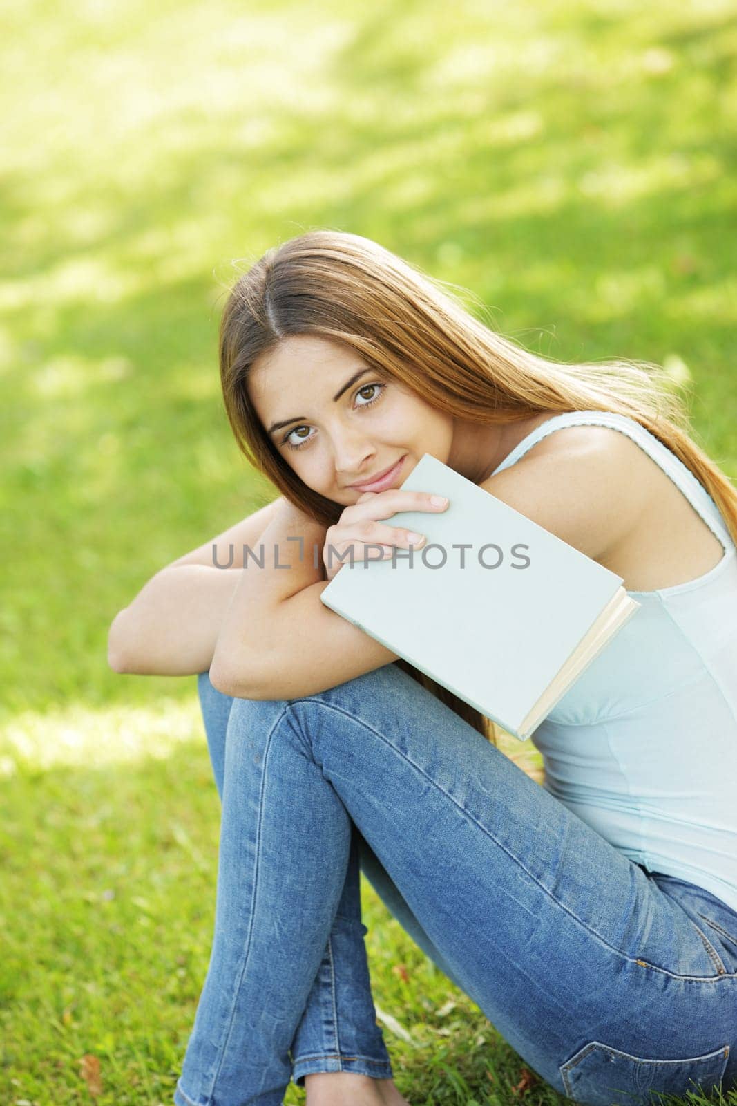 Young woman with book, copy space