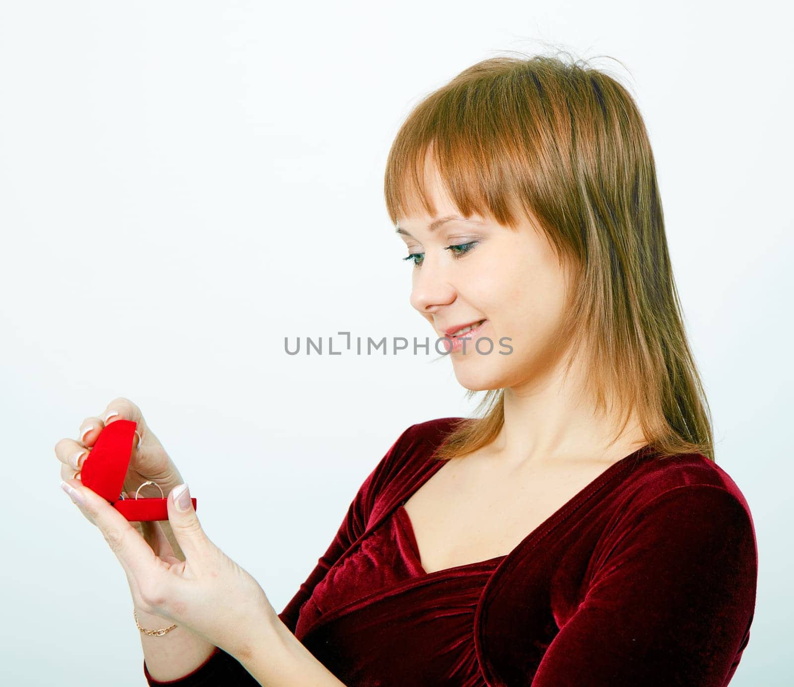 Attractive girl with a box for rings