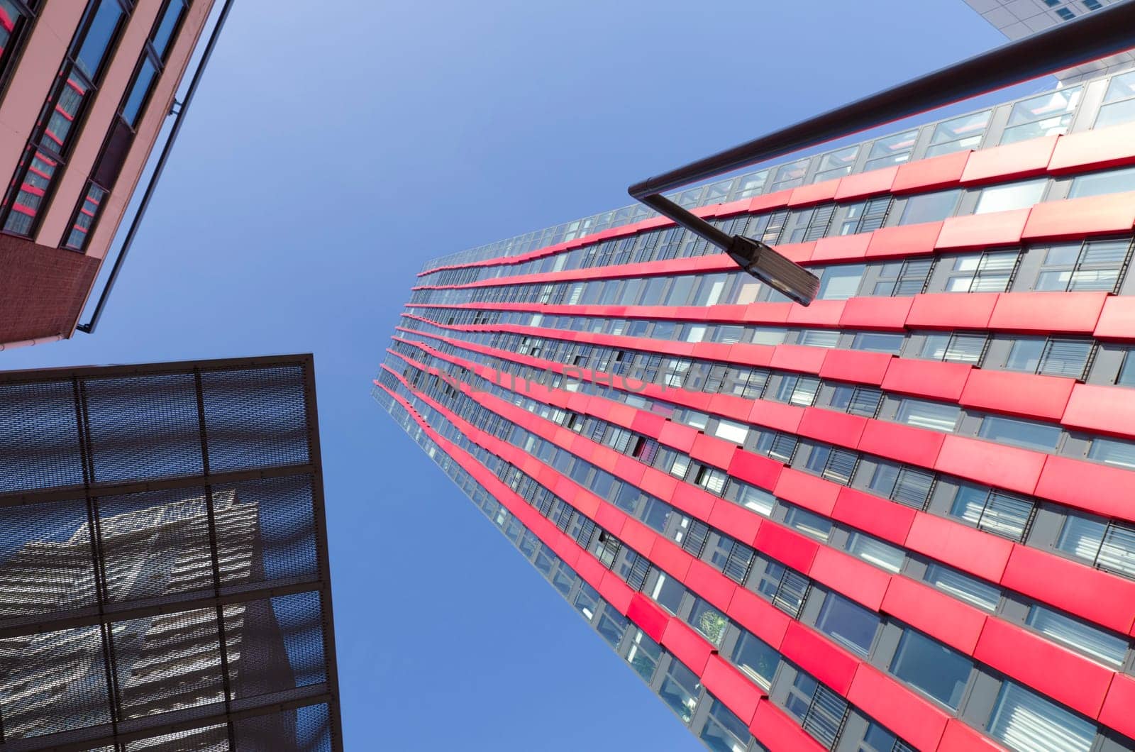 exterior of the 'red apple', a modern residential tower in Rotterdam. Designed by KCAP architects (exterior) and Jan des Bouvrie (interior), the 120 tall building counts 39 floors.
