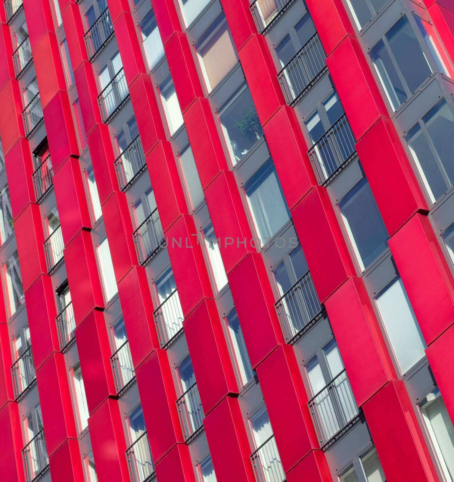 exterior of the 'red apple', a modern residential tower in Rotterdam. Designed by KCAP architects (exterior) and Jan des Bouvrie (interior), the 120 tall building counts 39 floors.