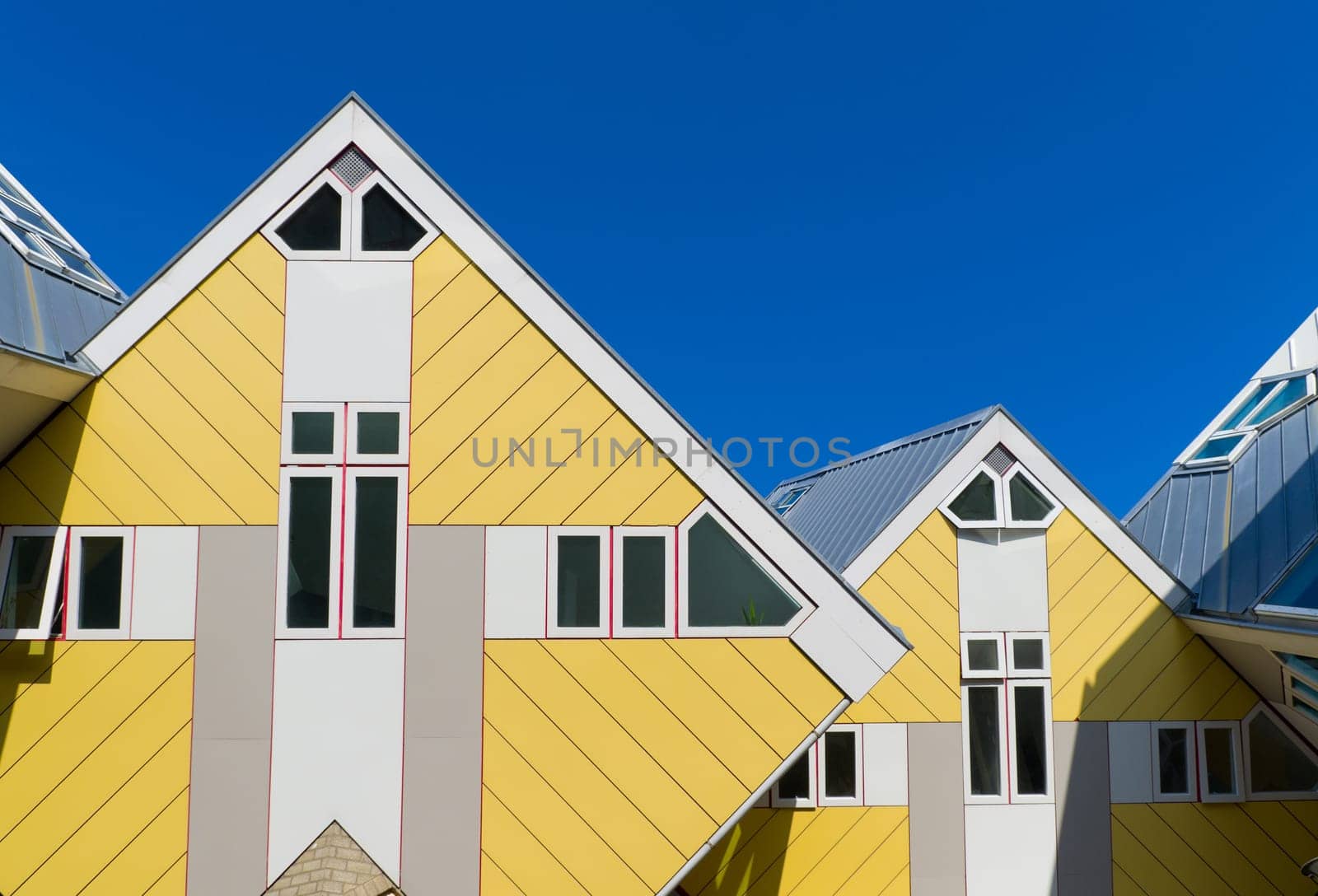 Cube houses, designed by architect Piet Blom. His design represents a village within a city, where each house represents a tree, and all the houses together, a forest