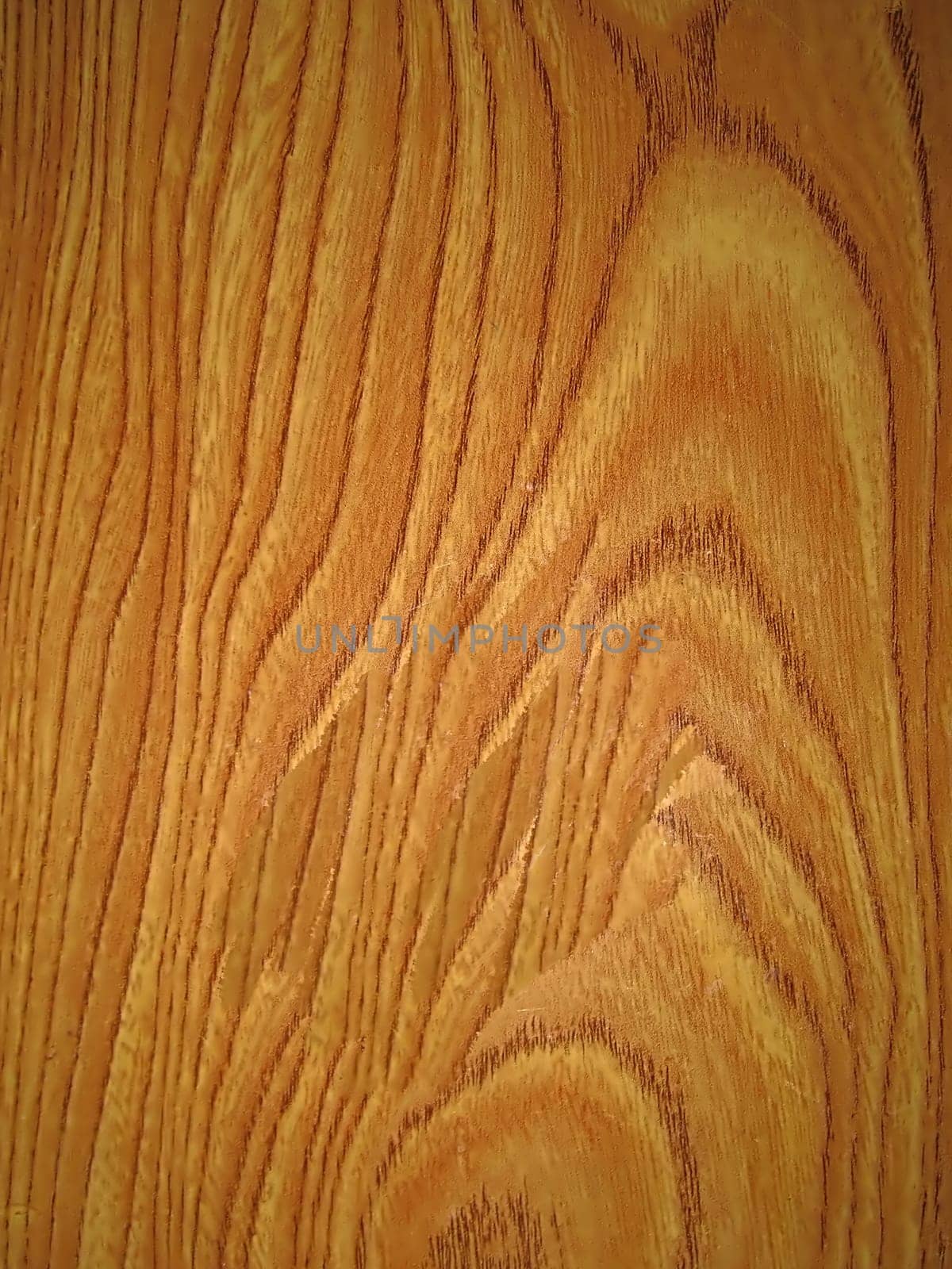background, low relief texture of the surface can be seen