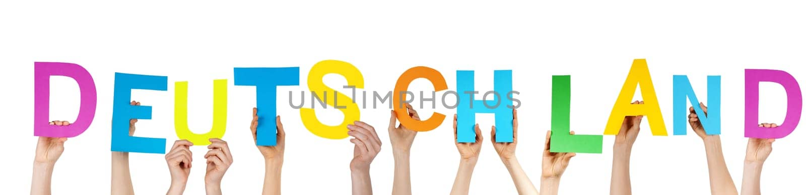 many hands holding the german word Deutschland which means germany, isolated