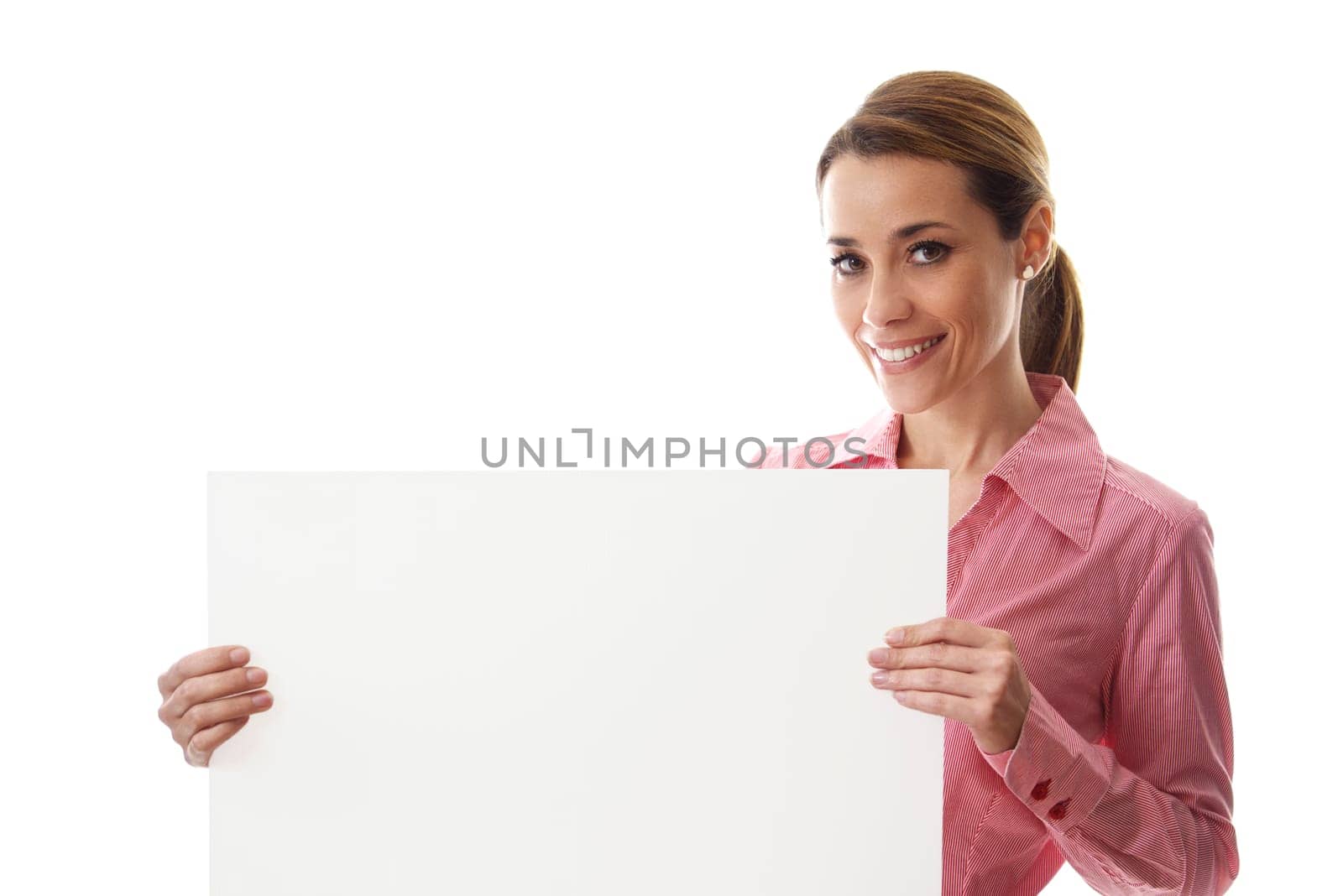 mid adult business woman smiling at camera and holding blank bill with copy space on white background